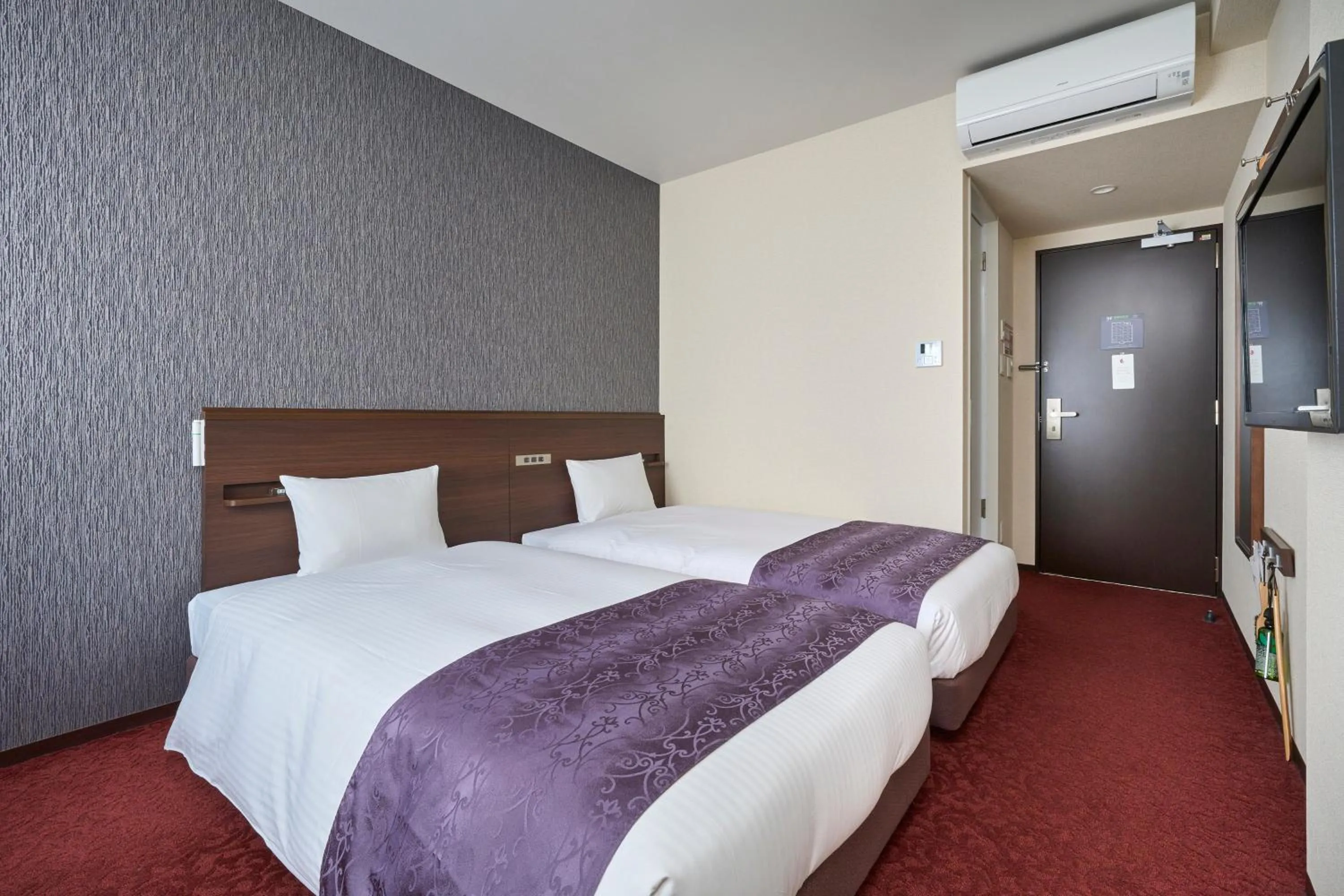 Photo of the whole room, Bed in Hotel Axia Inn Sapporo Susukino