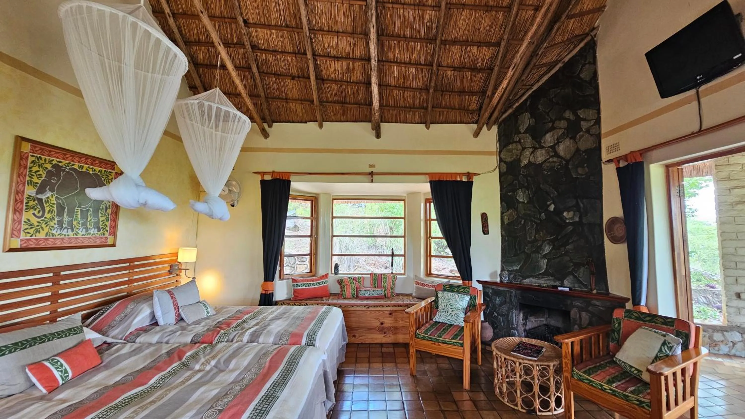Seating area, Bed in Musangano Lodge
