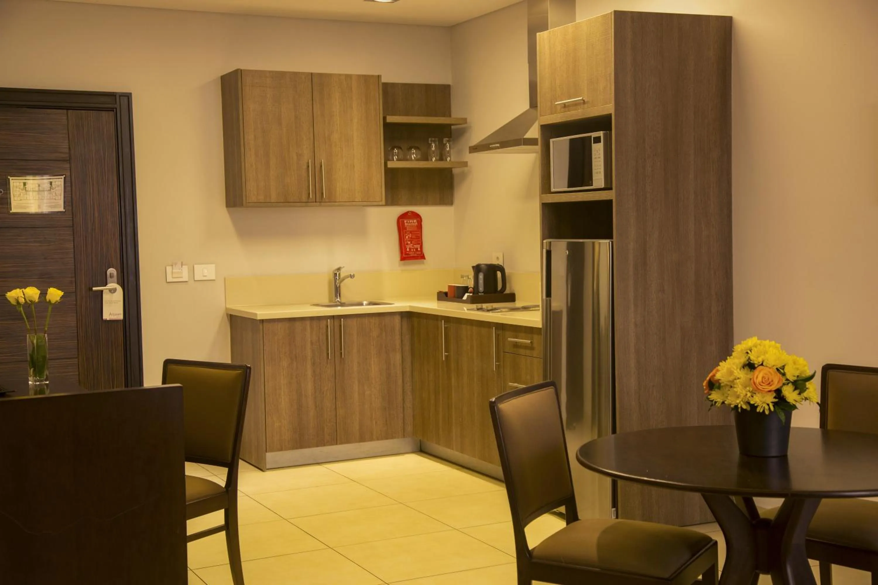 Kitchen or kitchenette in Kin Plaza Arjaan by Rotana