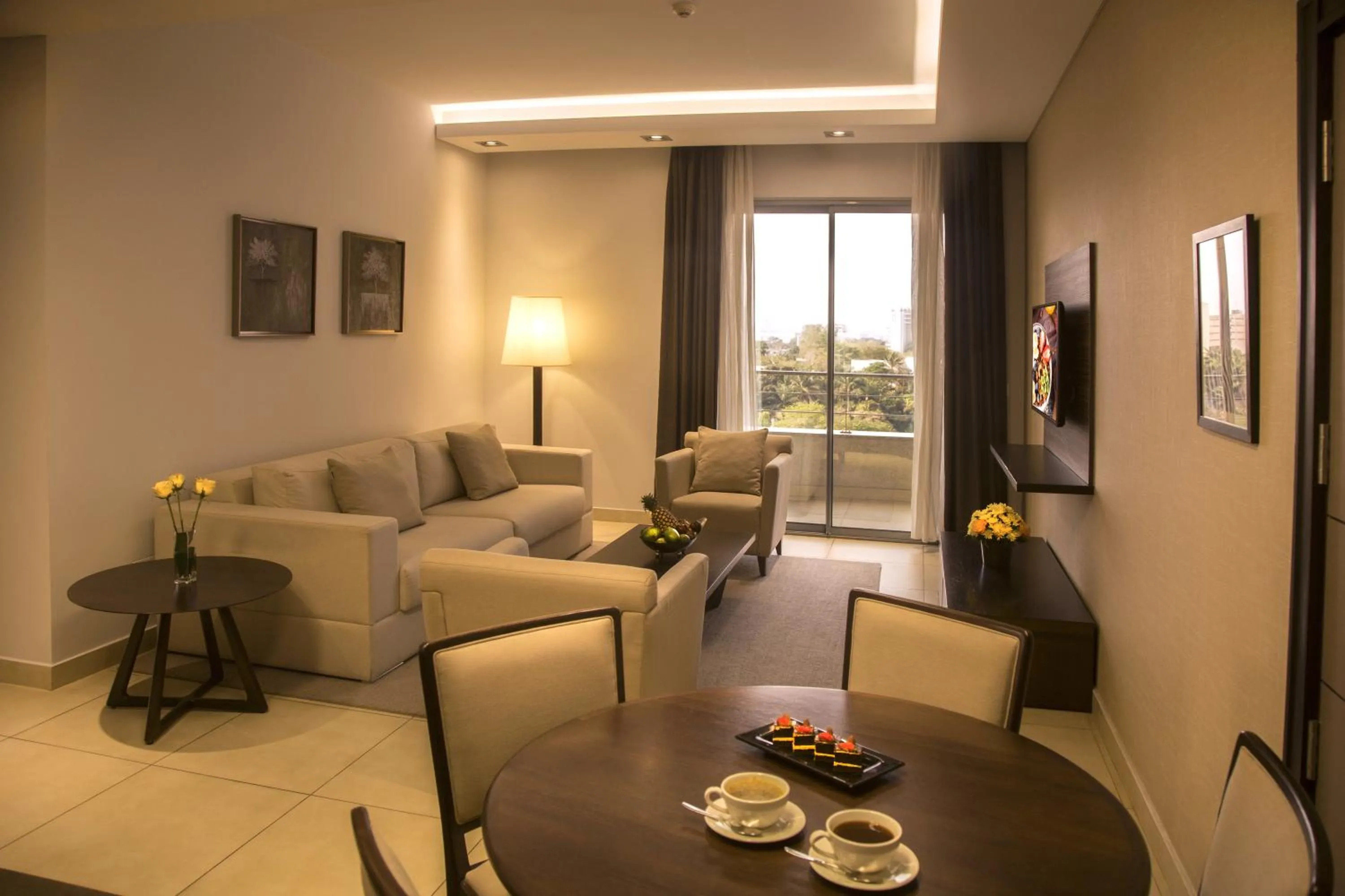 Living room in Kin Plaza Arjaan by Rotana