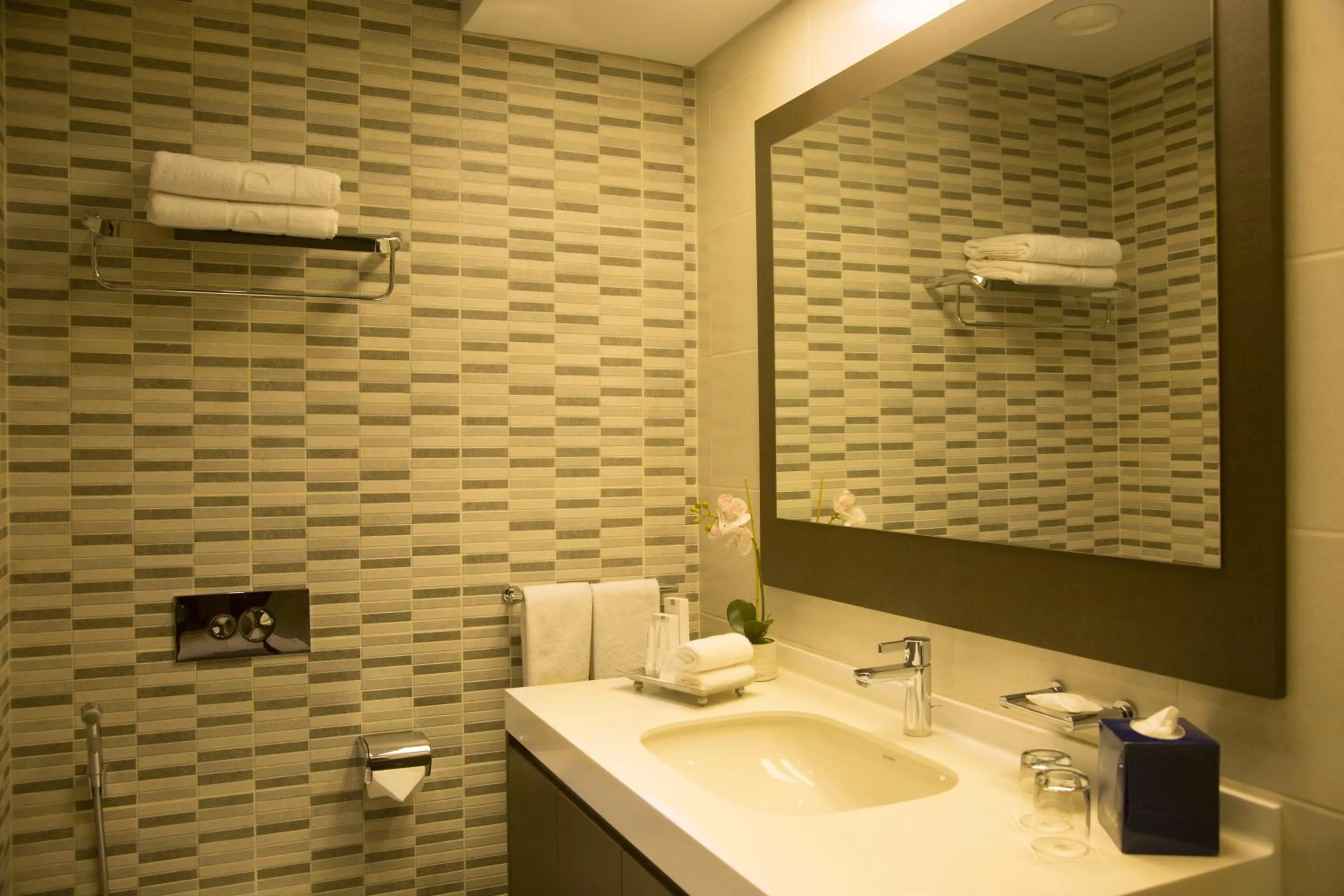 Bathroom in Kin Plaza Arjaan by Rotana