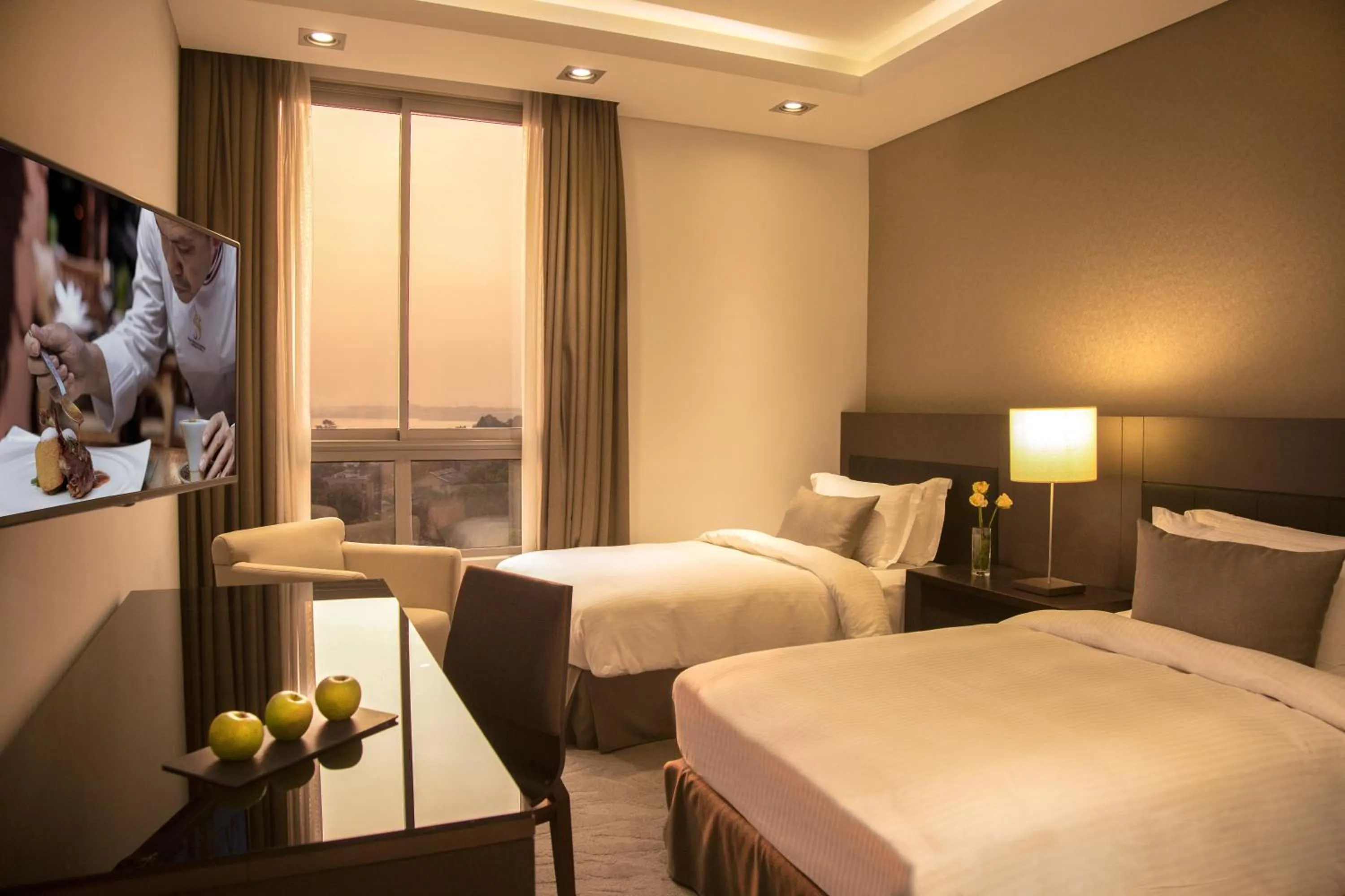 Bed in Kin Plaza Arjaan by Rotana