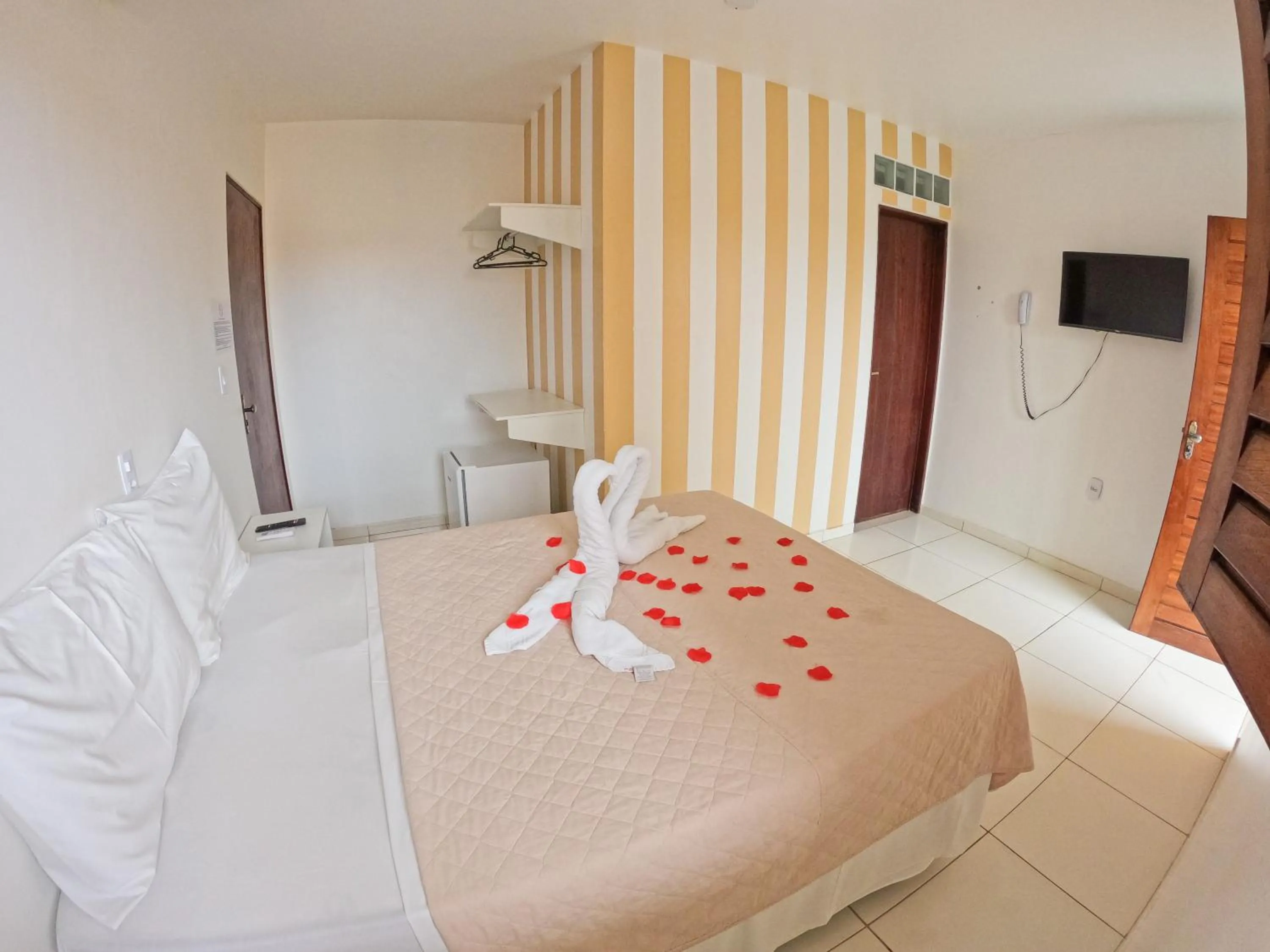 Bed in Pousada Paris