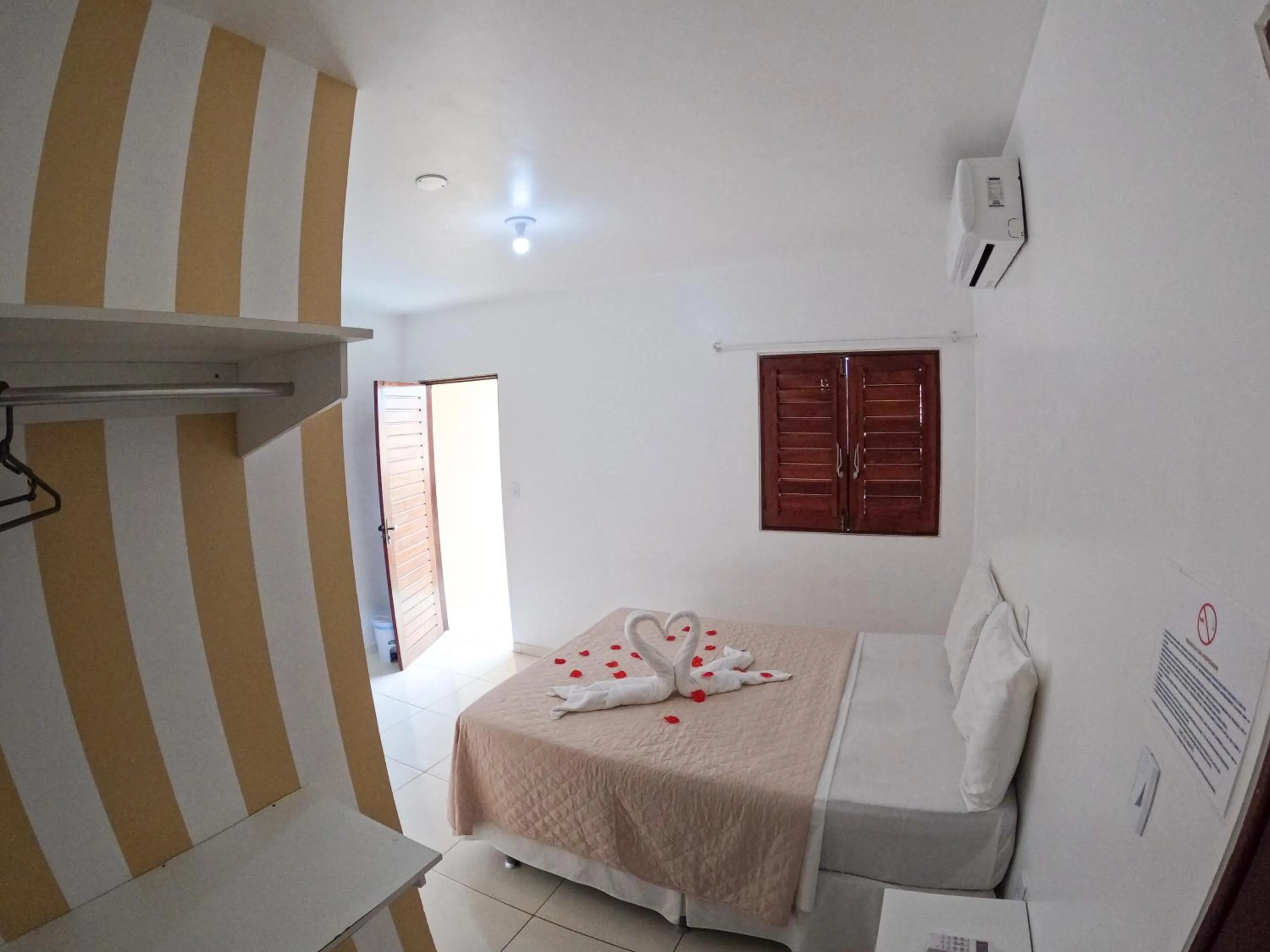 Bed in Pousada Paris