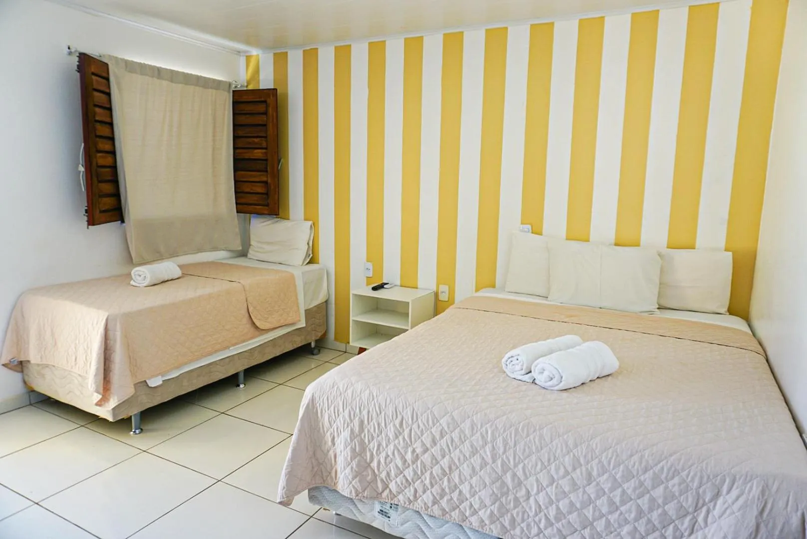 Bed in Pousada Paris