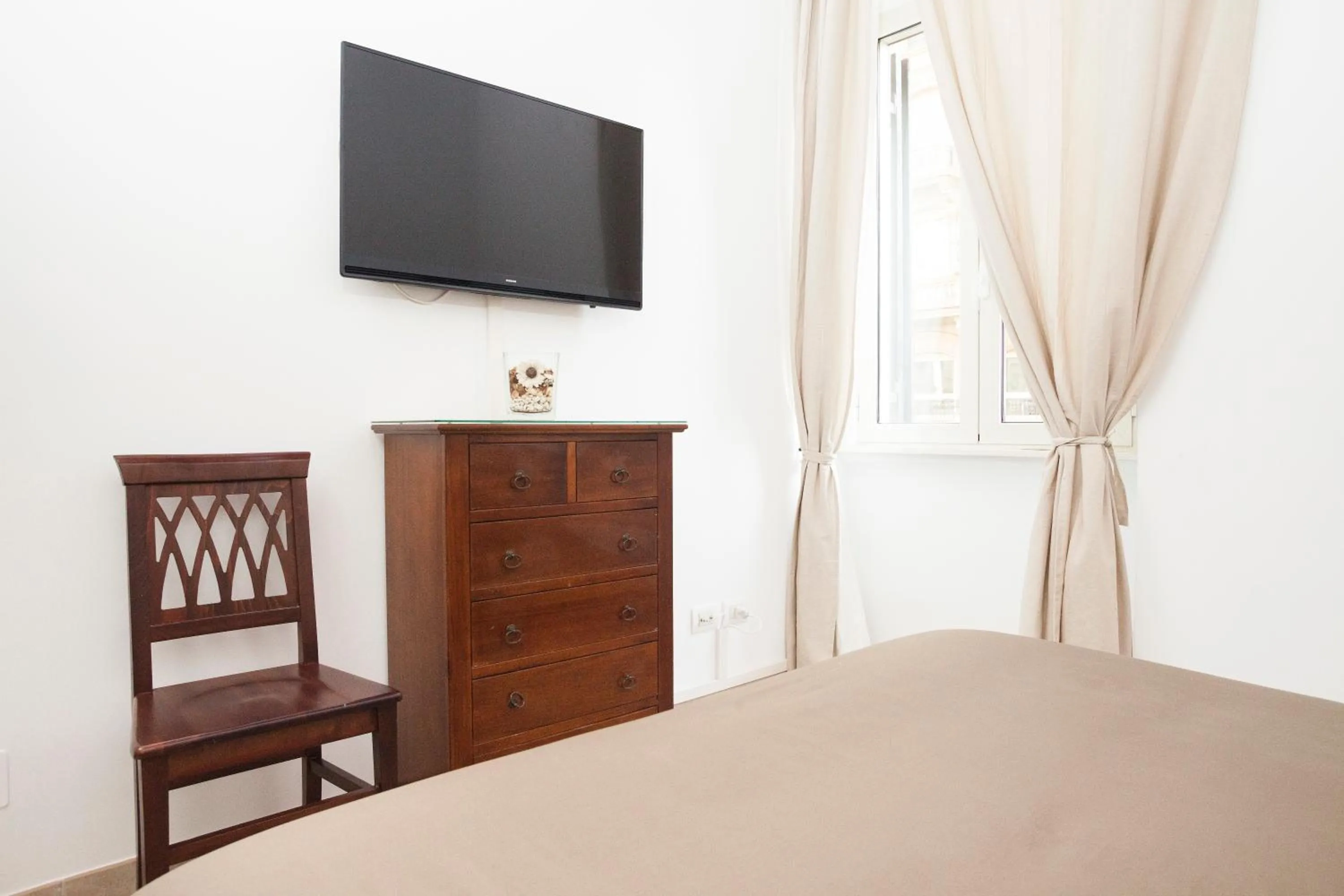 Bedroom, Bed in Tritone 91 Apartments