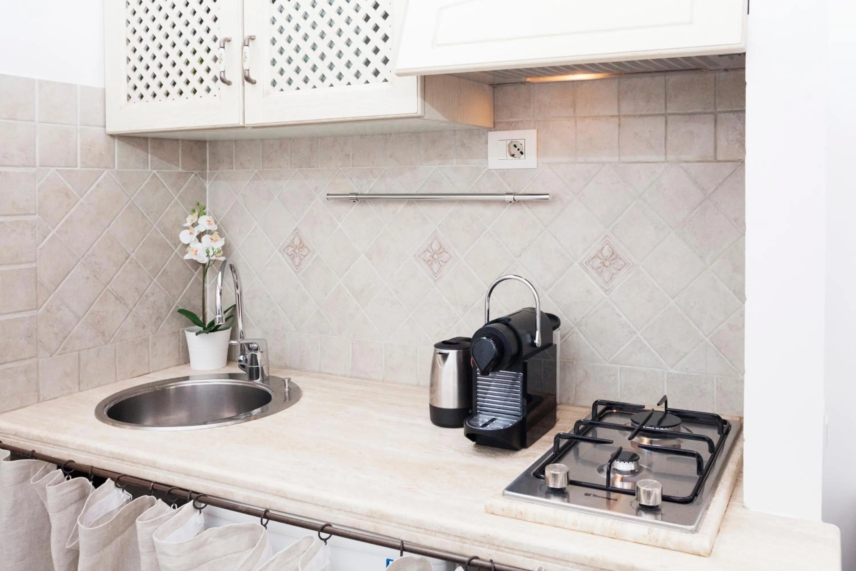 Kitchen or kitchenette in Tritone 91 Apartments