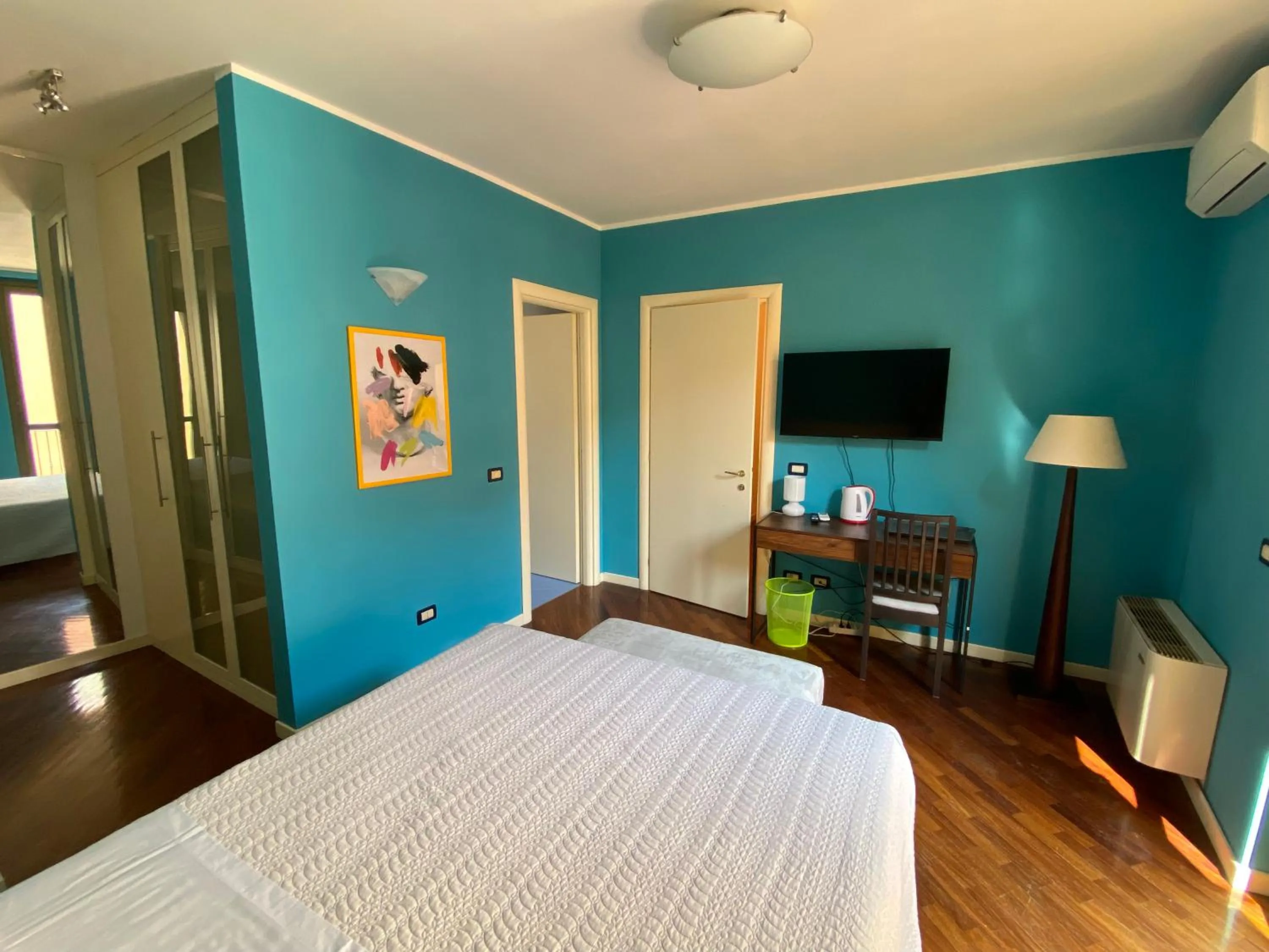 Bed in Amici Miei Rooms