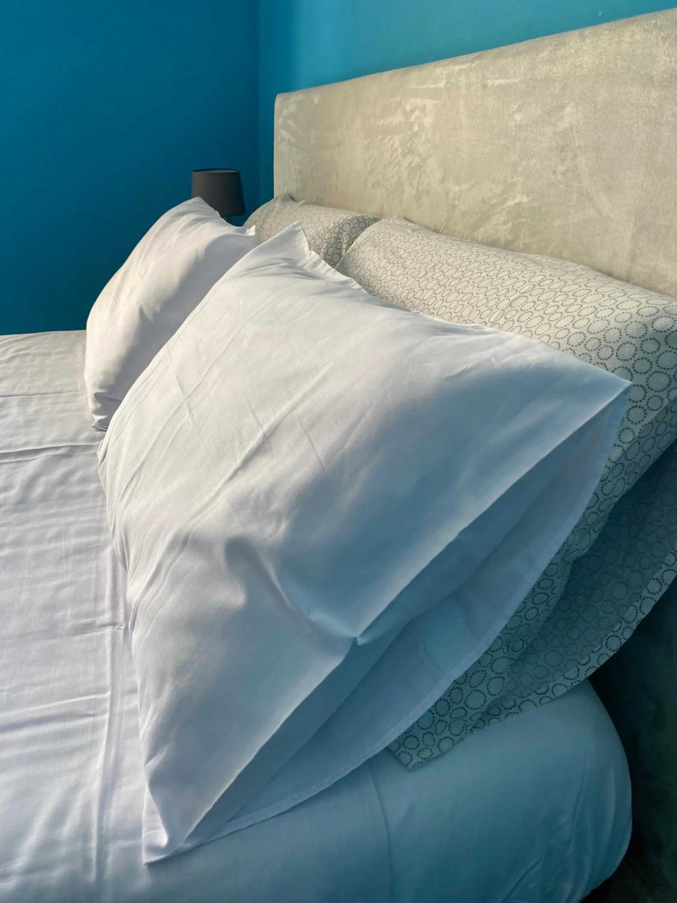 Bed in Amici Miei Rooms