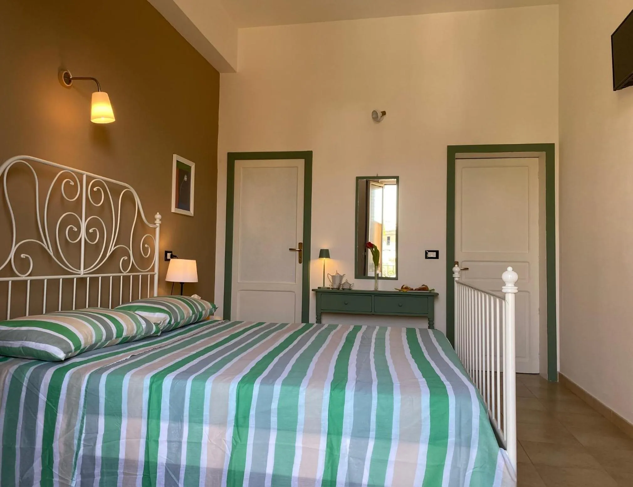 Bed in Bellassai Rooms