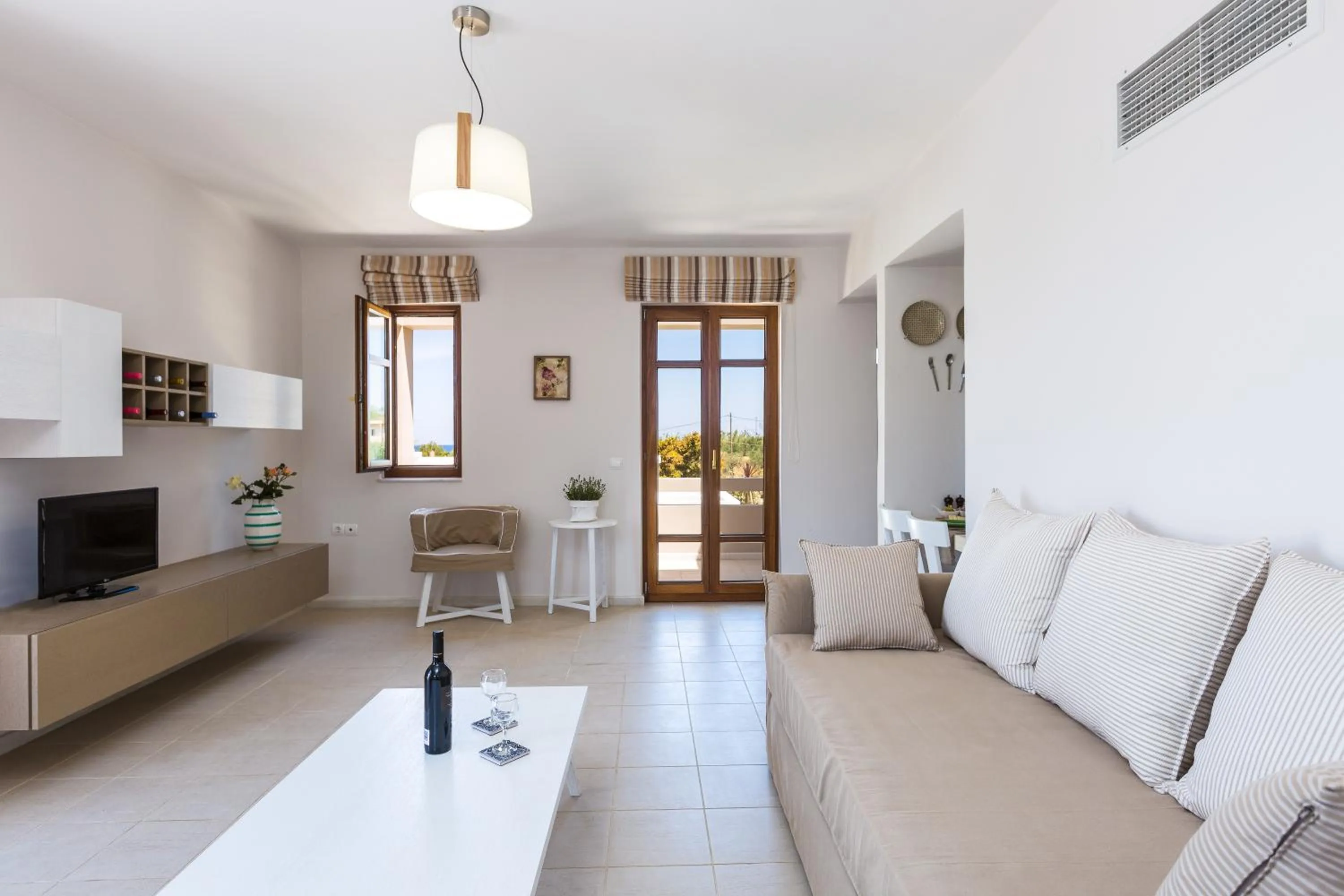 Living room in Mikro Livadi Special Lodges - Has an Eco Salt water pool - 150m from the beach