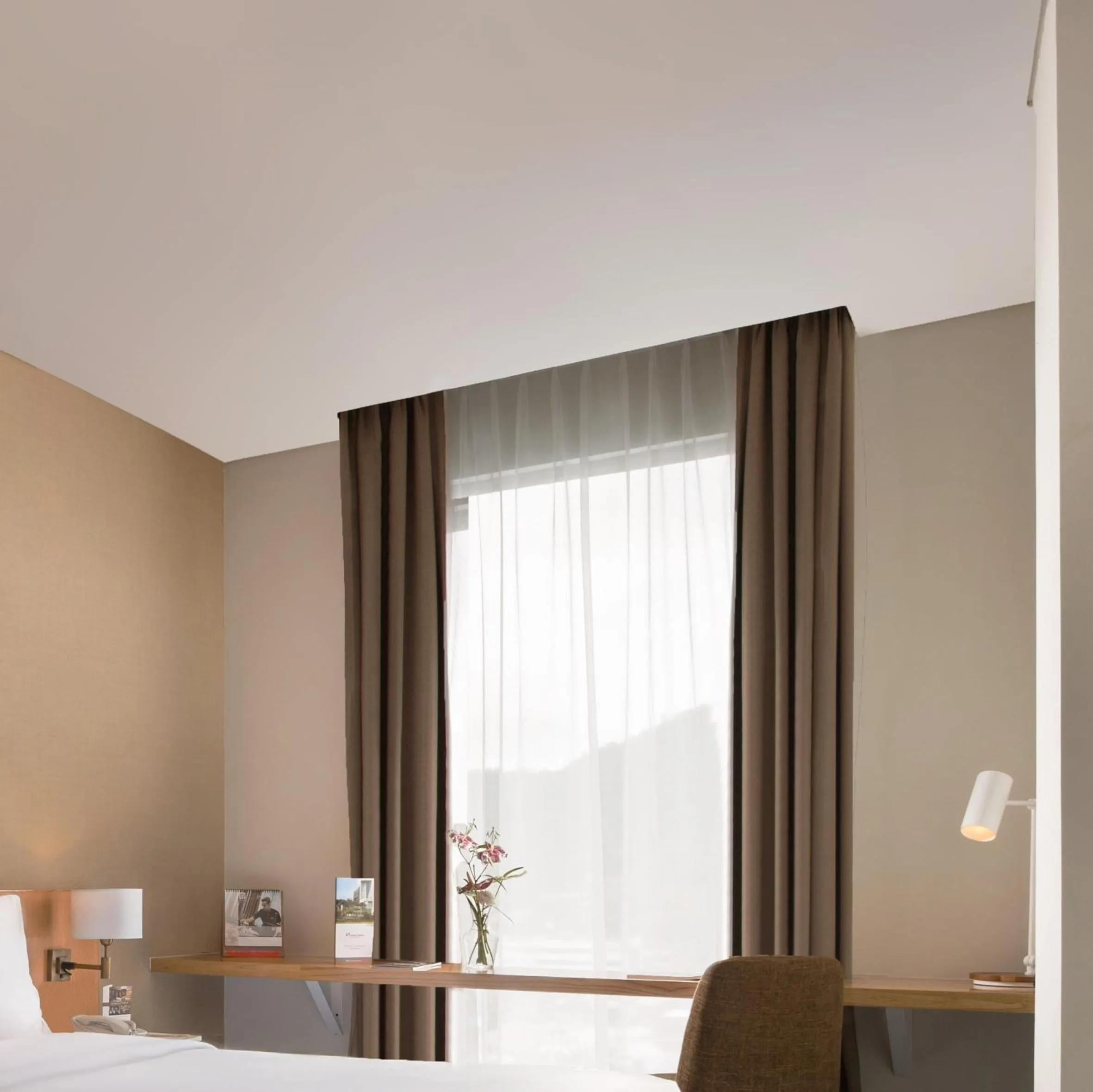 Seating area, Bed in Swiss-Belinn Singkawang