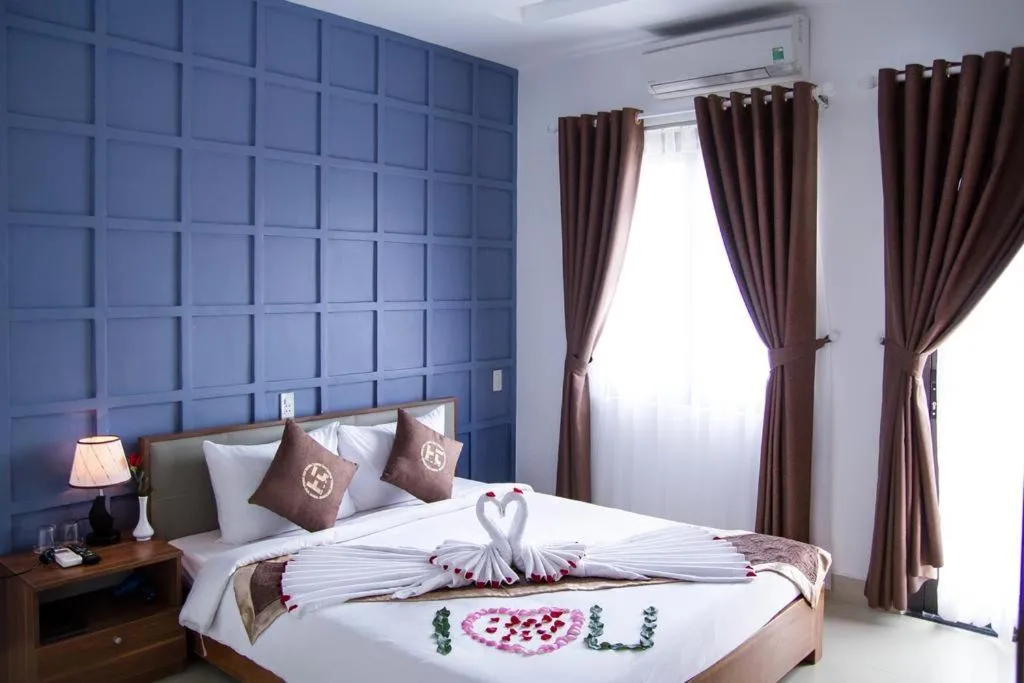Bed in Poetic Hue Hotel & Spa