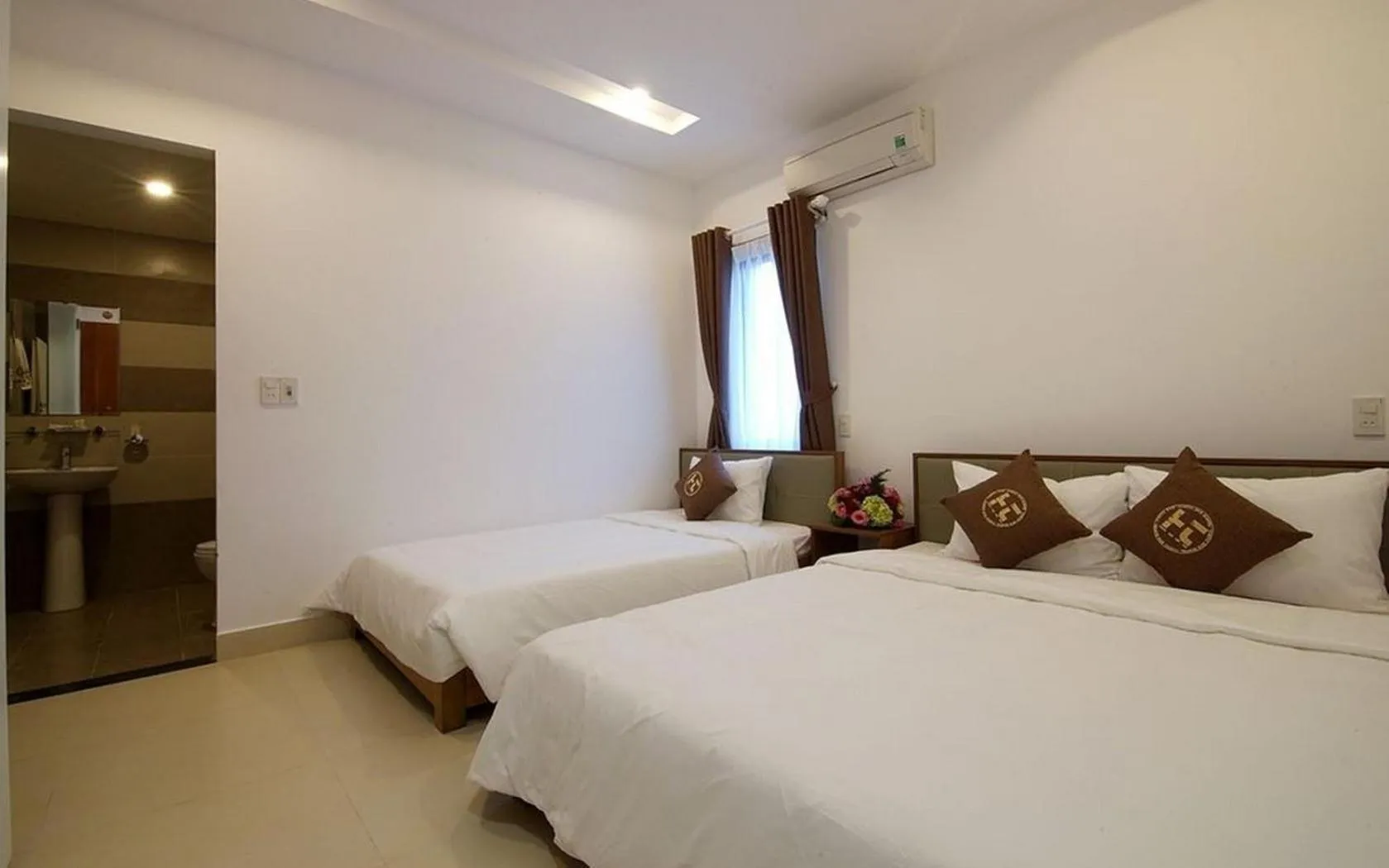 Bed in Poetic Hue Hotel & Spa