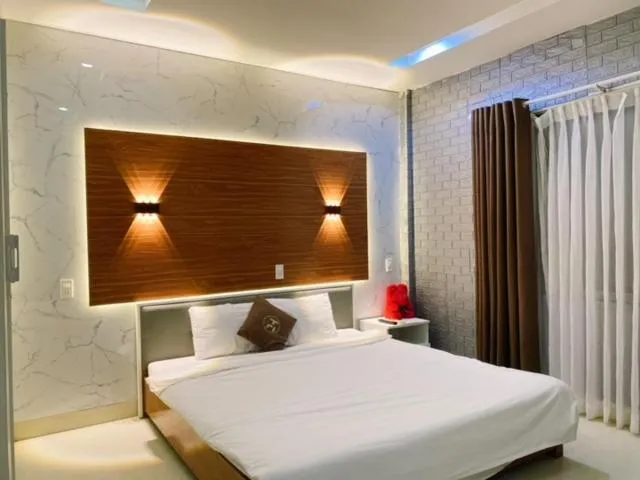 Bed in Poetic Hue Hotel & Spa