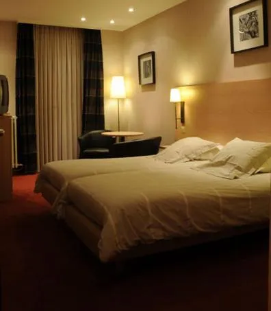 Bed in Hotel Escapade