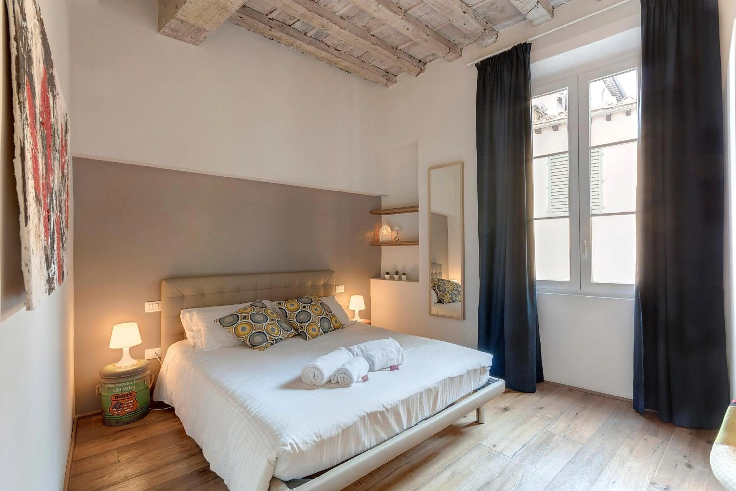 Bed in Boheme Apartment by Mamo Florence