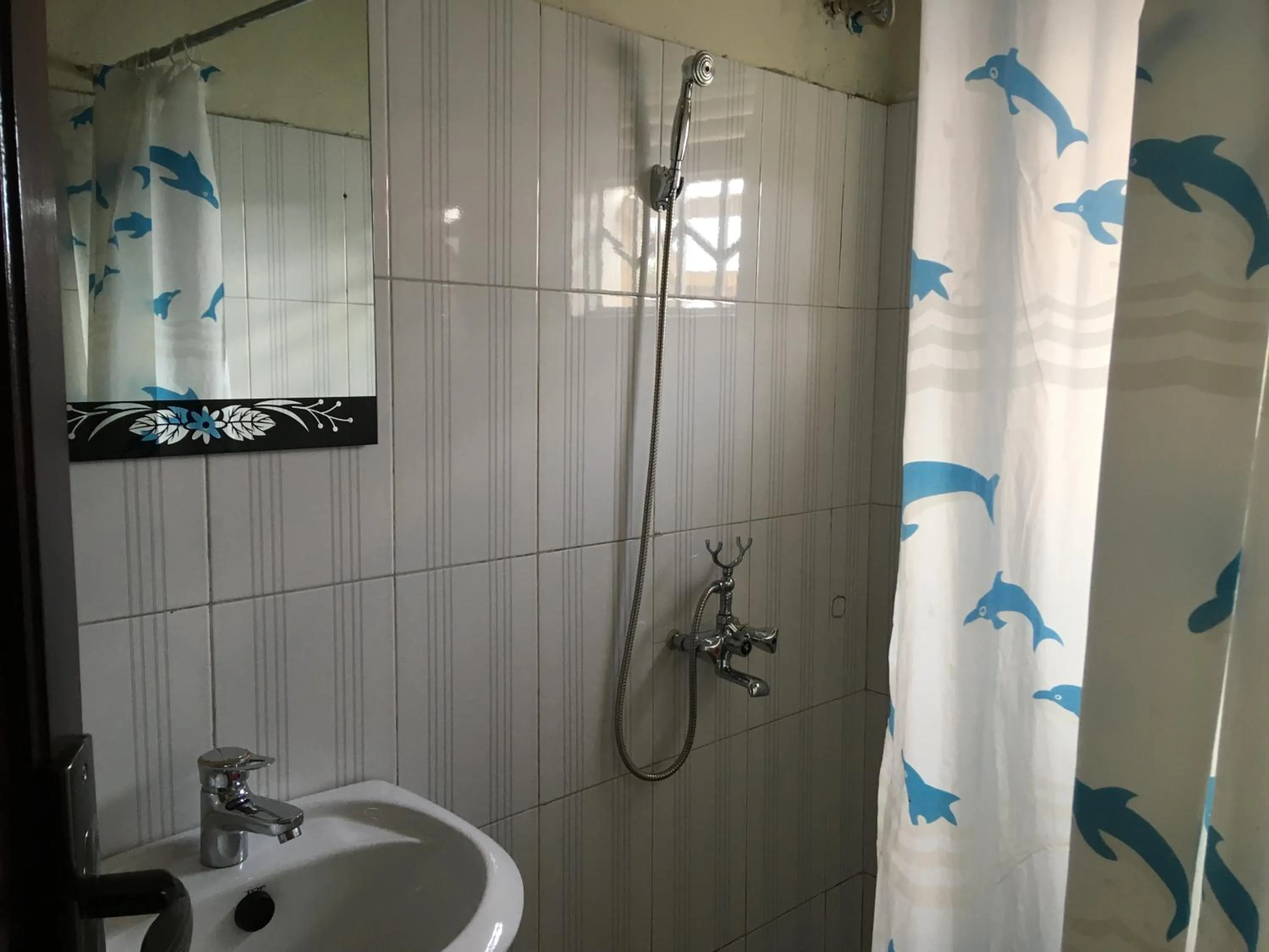 Shower in Dream Palace Hotel Mbale