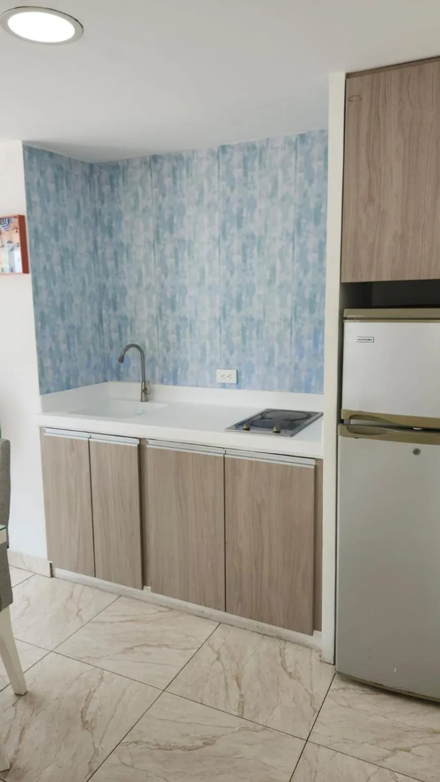 Kitchen or kitchenette in ZOJO MARiNA BAY