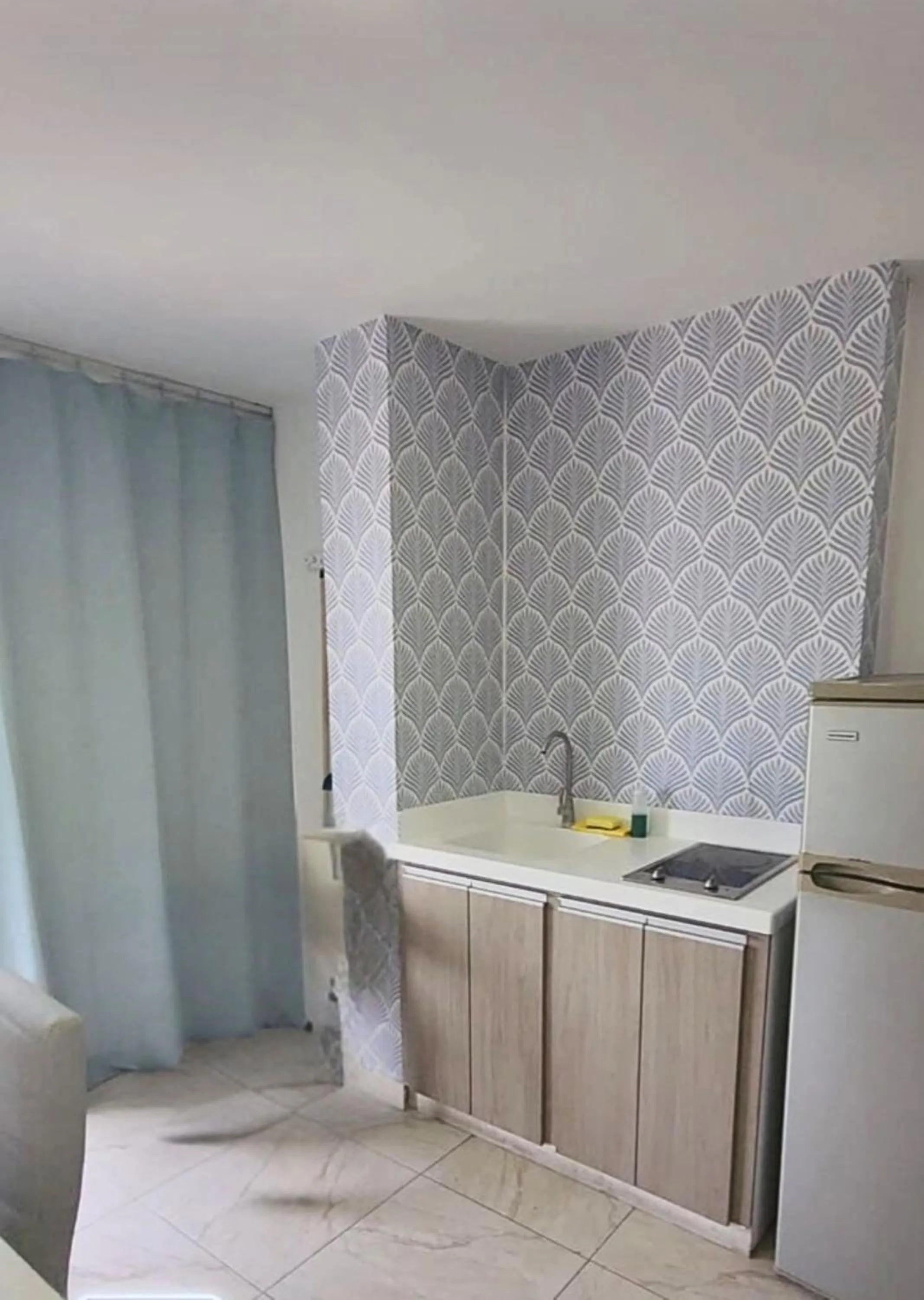 Kitchen or kitchenette in ZOJO MARiNA BAY