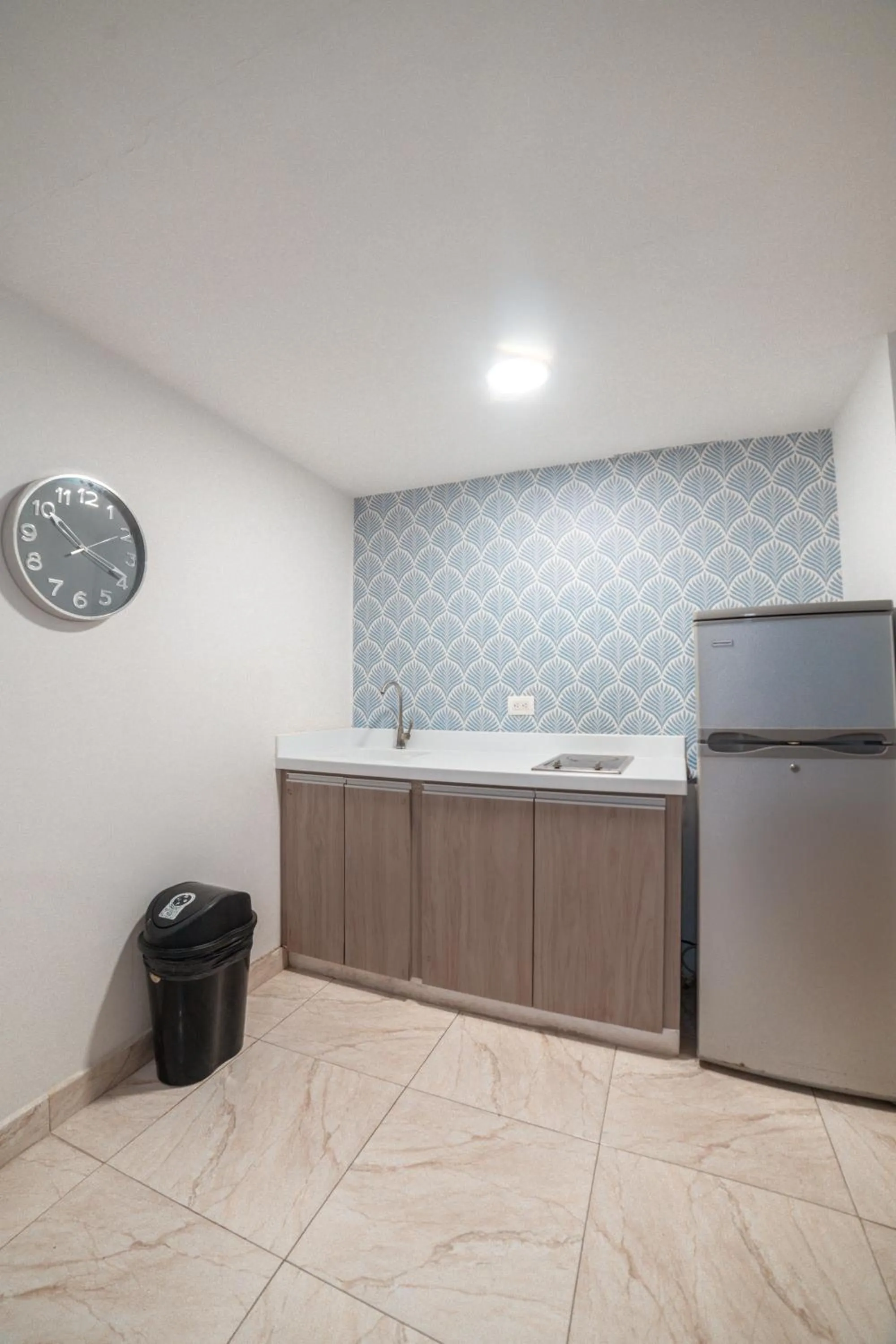 Kitchen or kitchenette in ZOJO MARiNA BAY