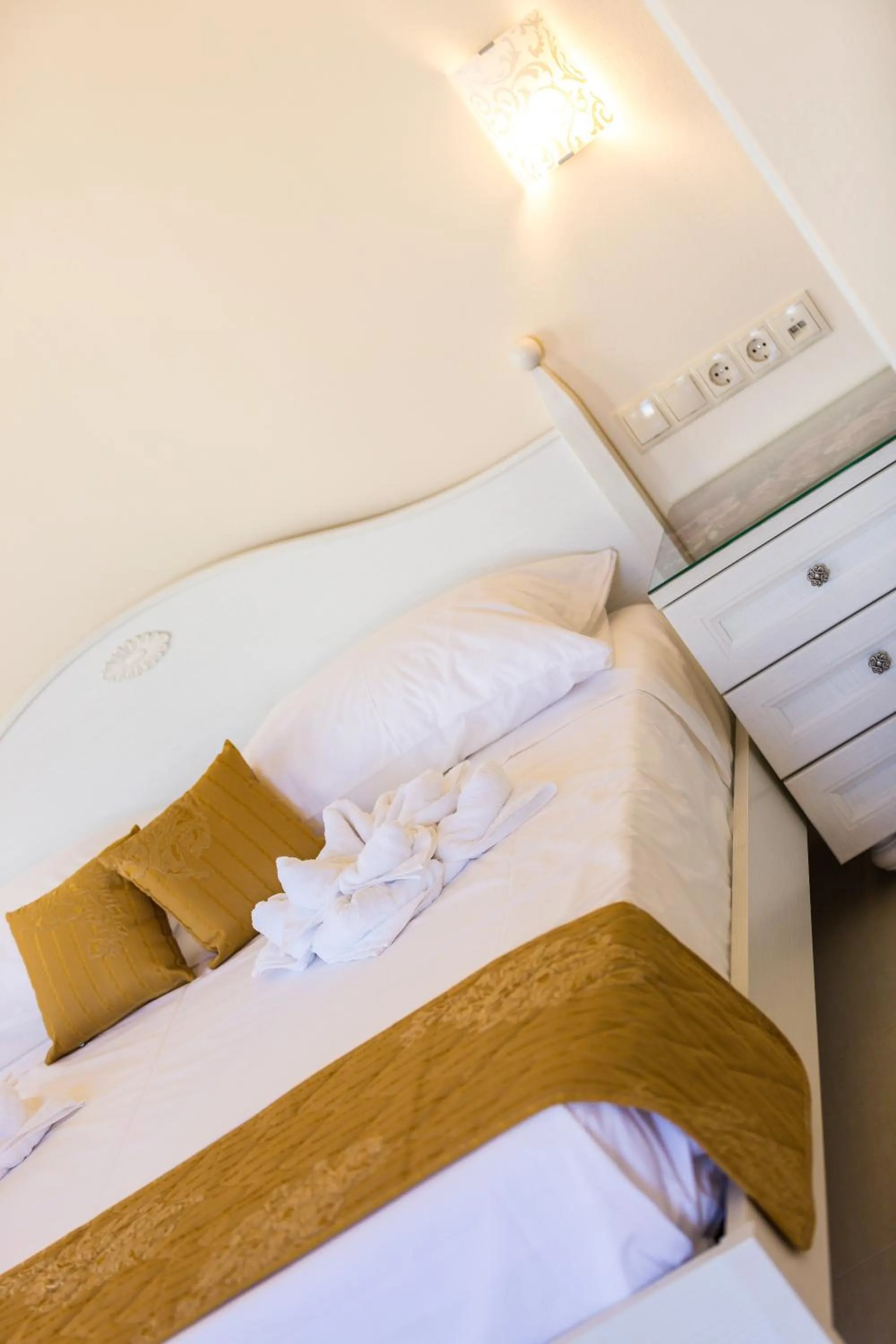 Bed in Polyxenia Suites