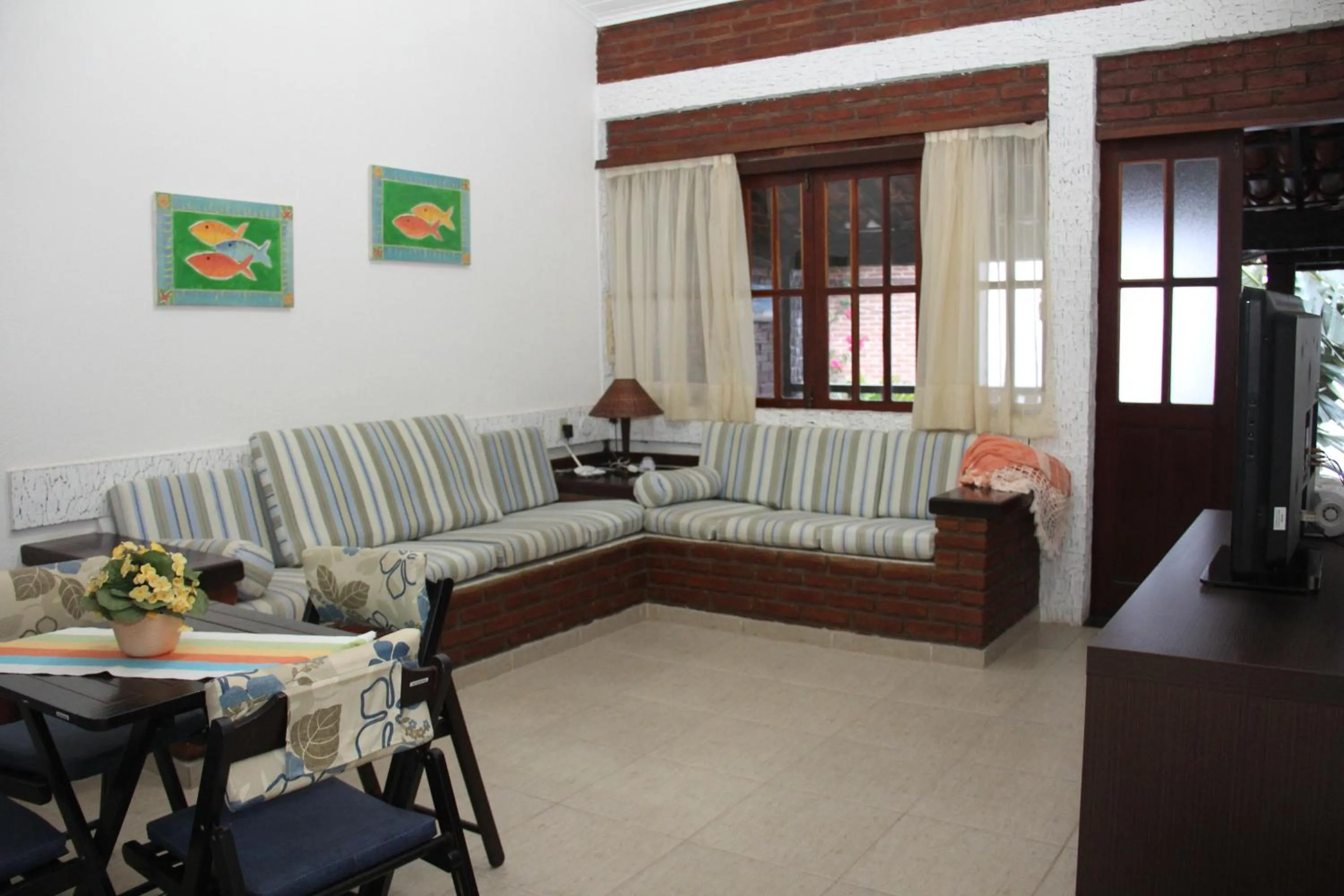 Communal lounge/ TV room in Apart Hotel Pet Friendly em Búzios