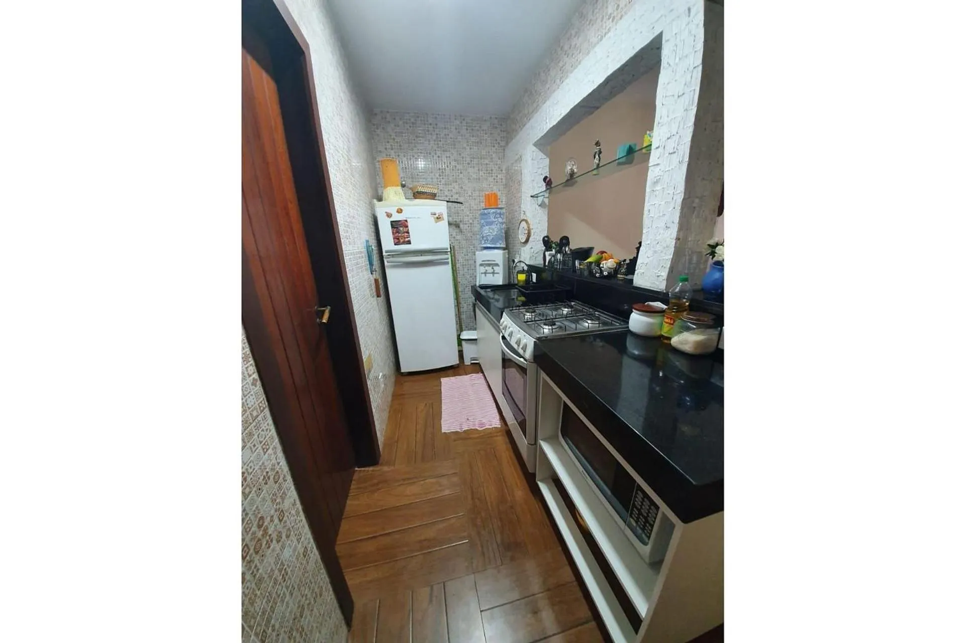 Kitchen or kitchenette in Apart Hotel Pet Friendly em Búzios