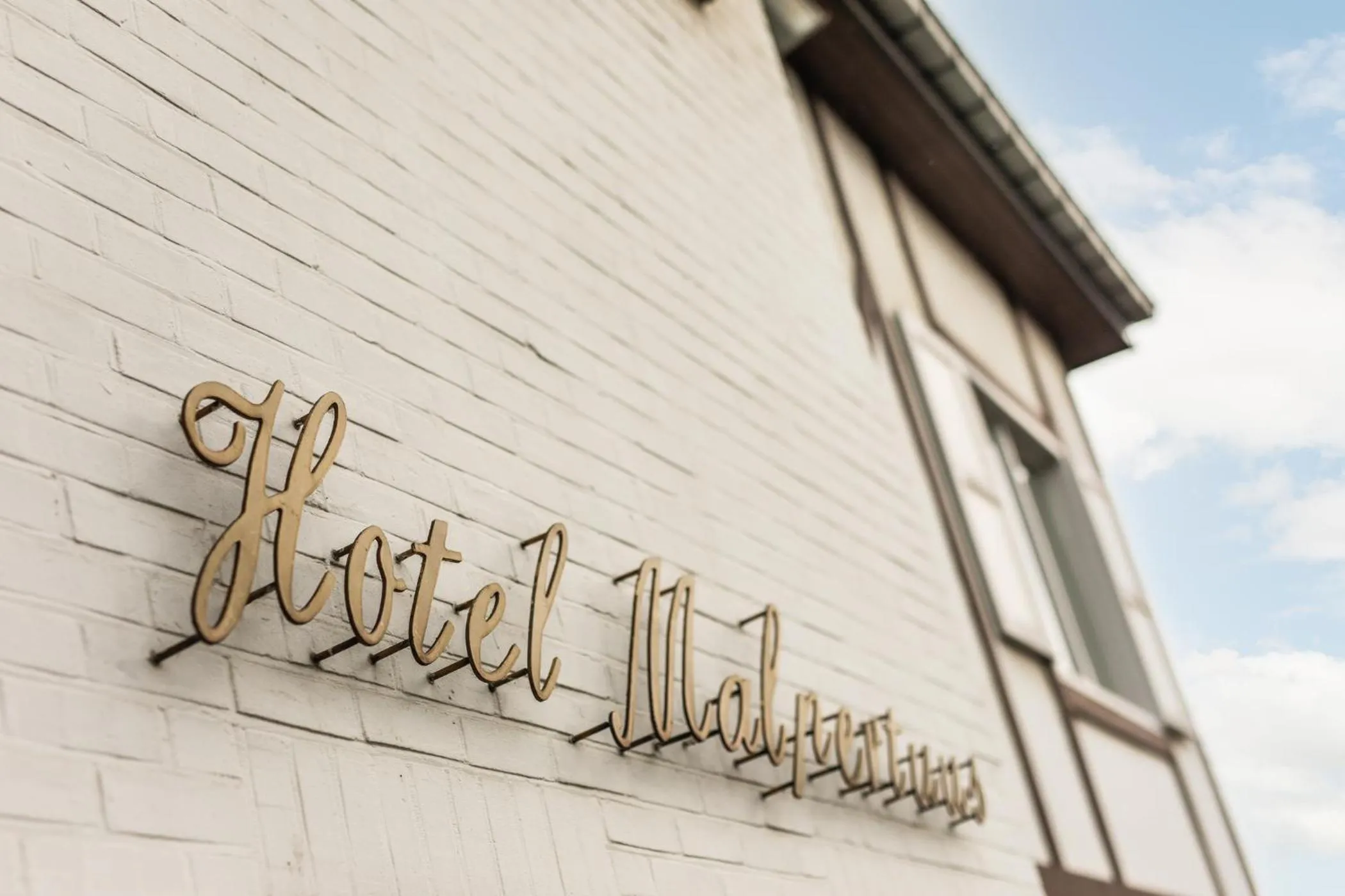 Property logo or sign in Hotel Malpertuus