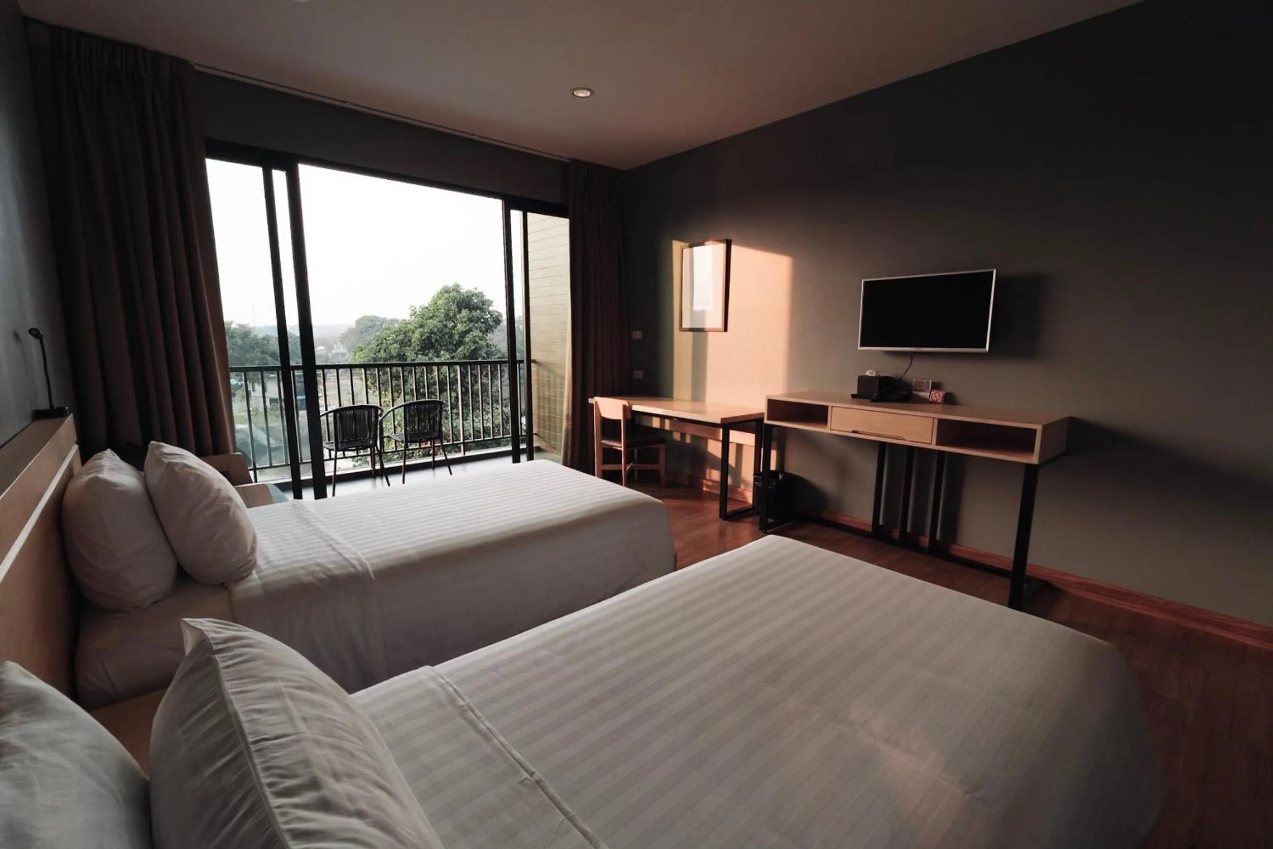Bed in Riverawan Hotel