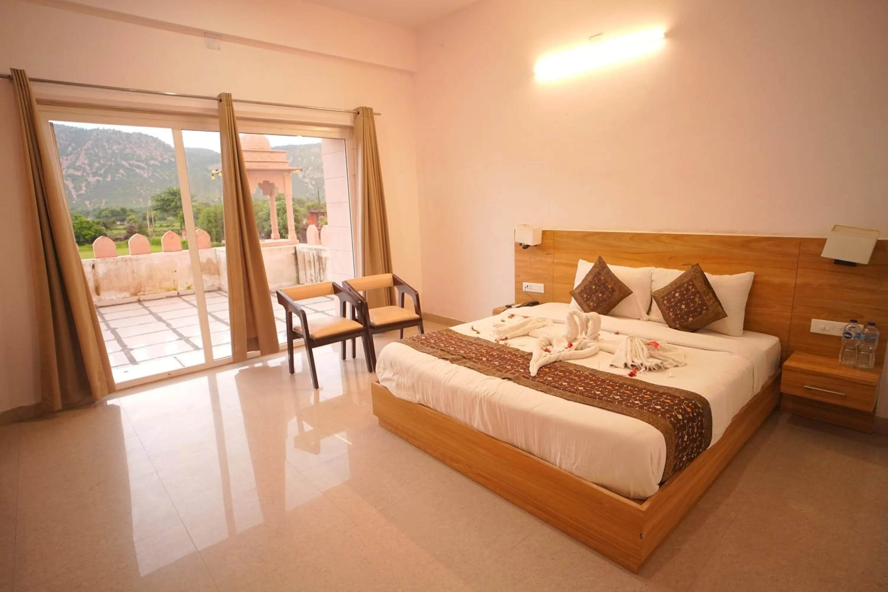 Bedroom, Bed in Dhawala Resort By Aamod