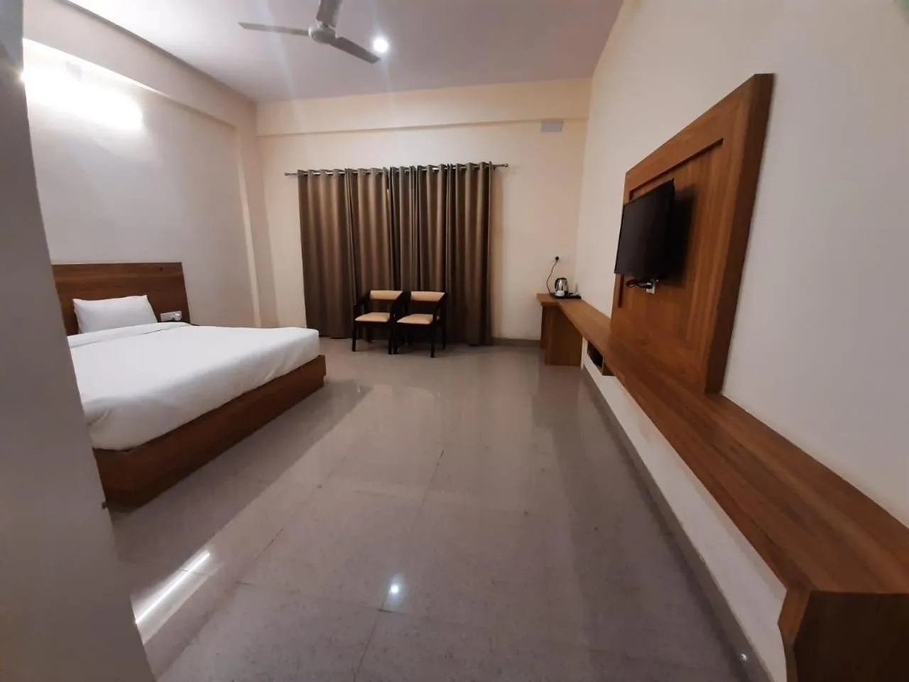 Bed in Dhawala Resort By Aamod