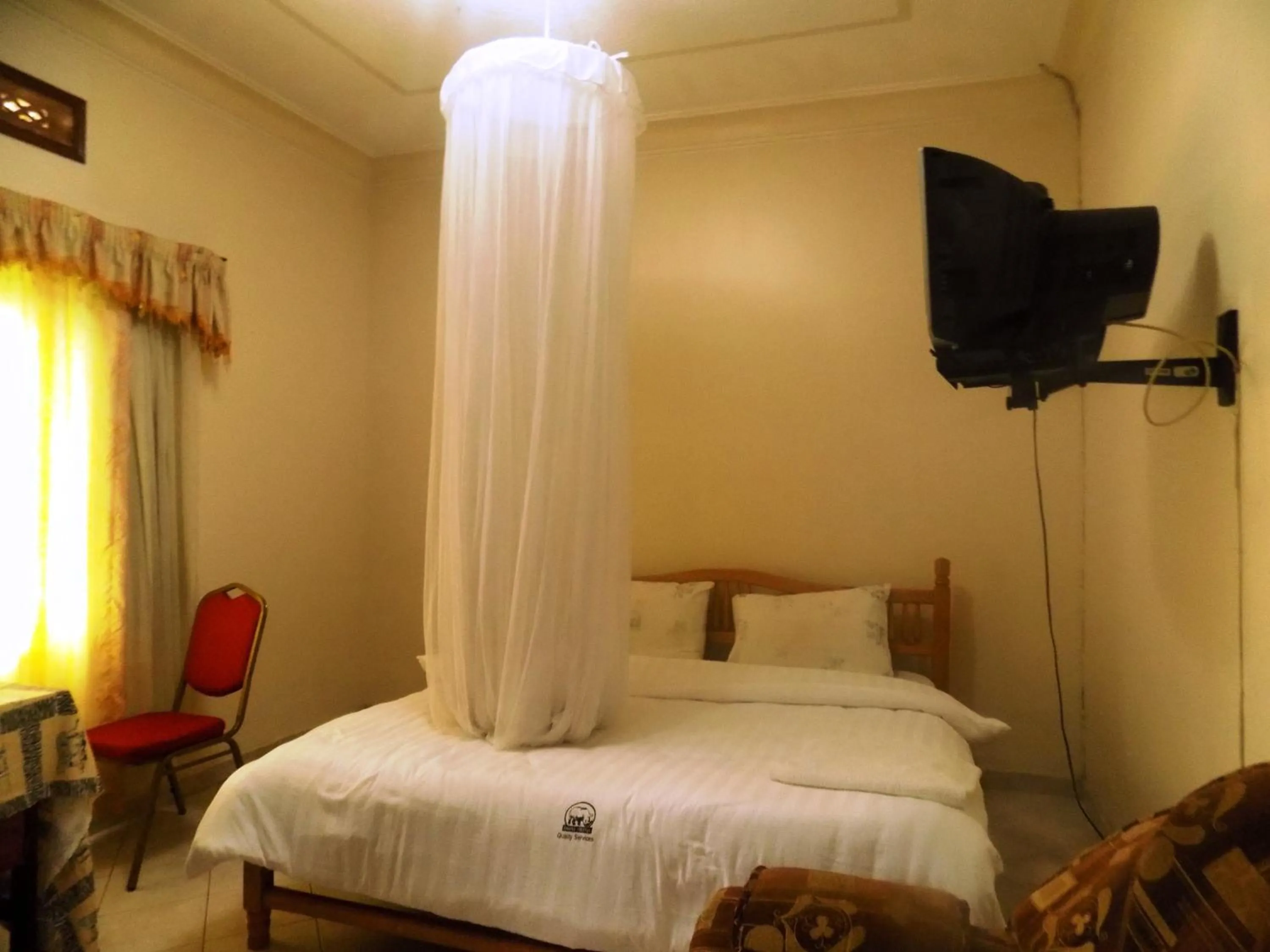 Bed in Rhino Motel Mbarara