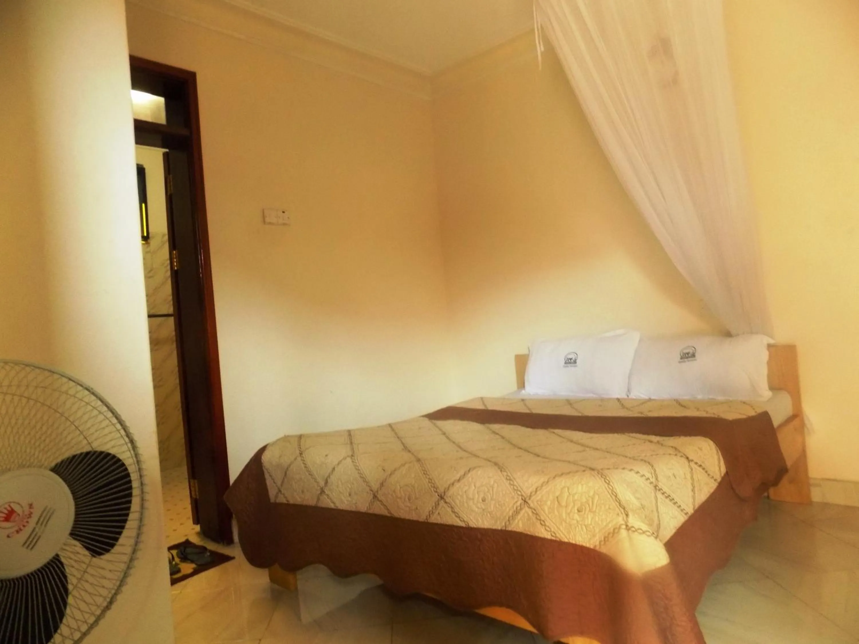 Bed in Rhino Motel Mbarara