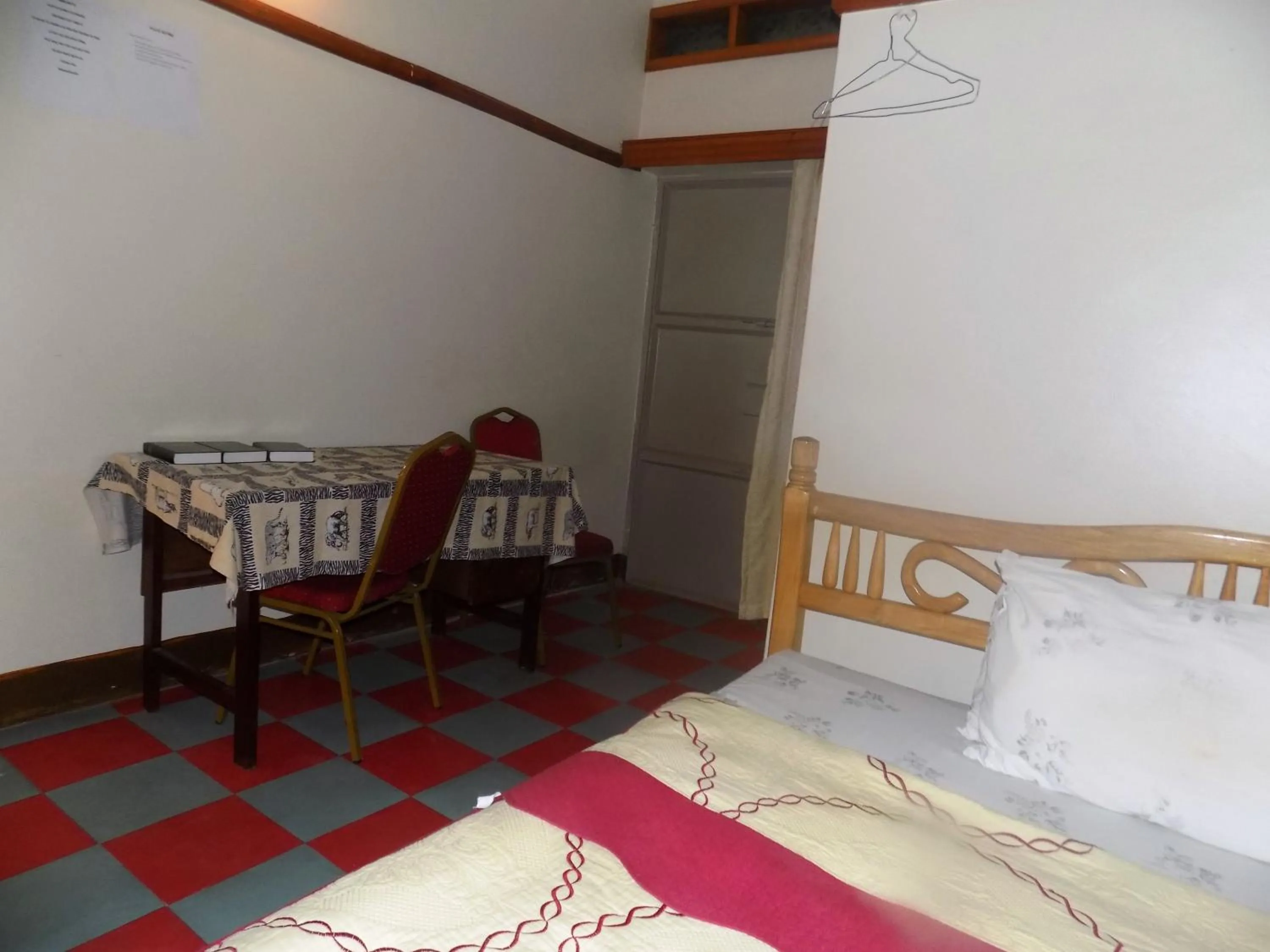 Bed in Rhino Motel Mbarara