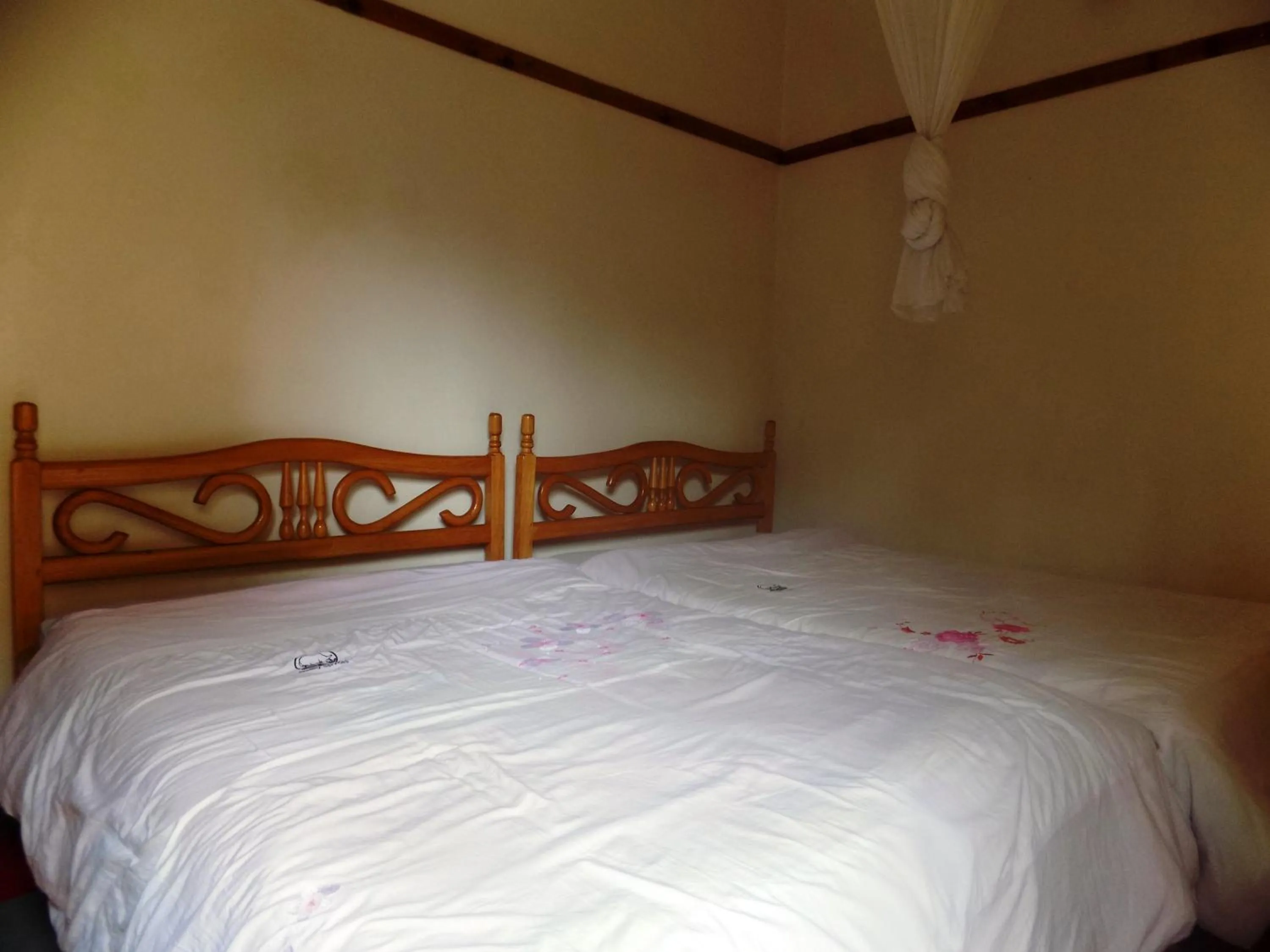 Bed in Rhino Motel Mbarara