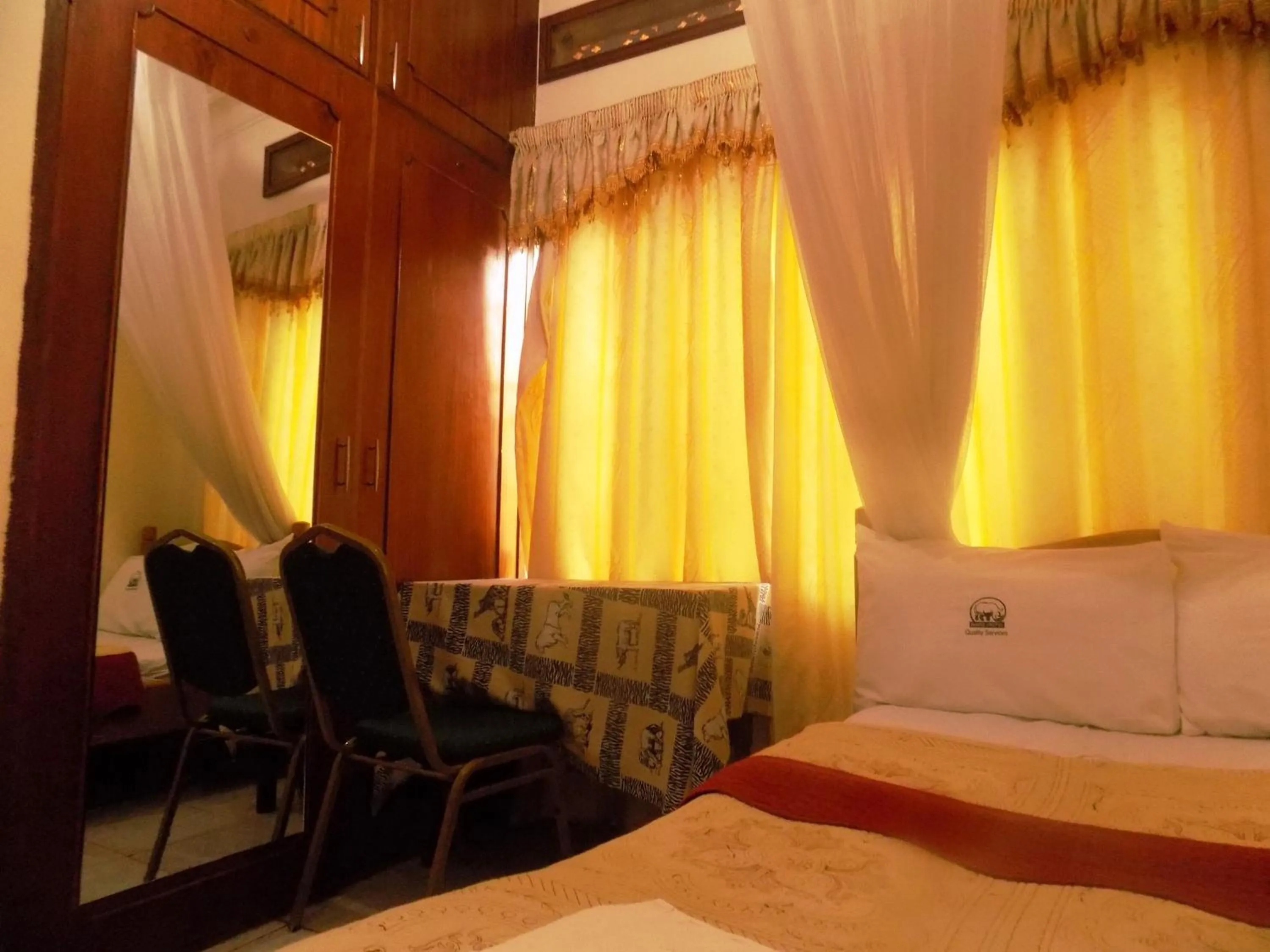 Bed in Rhino Motel Mbarara