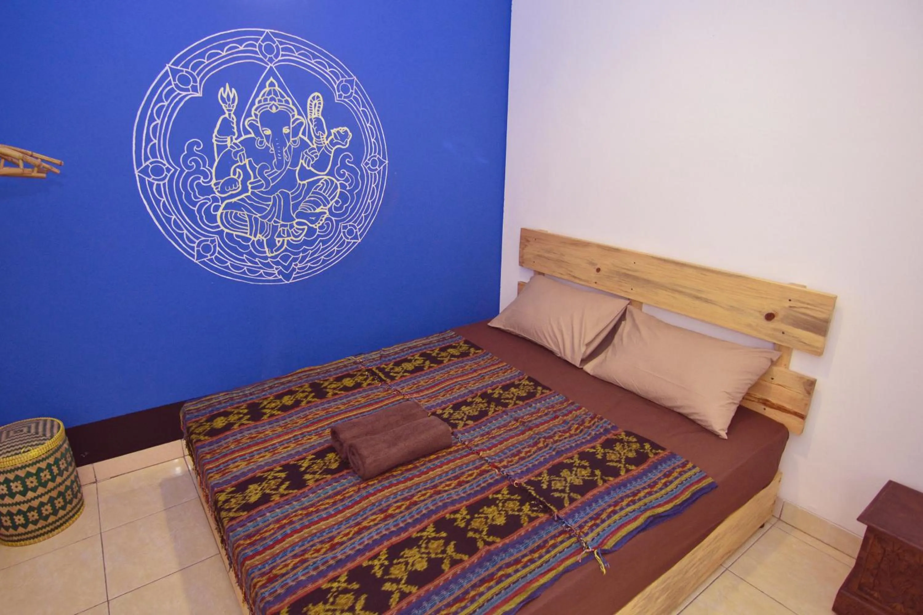 Bed in Happy Buddha Yogyakarta
