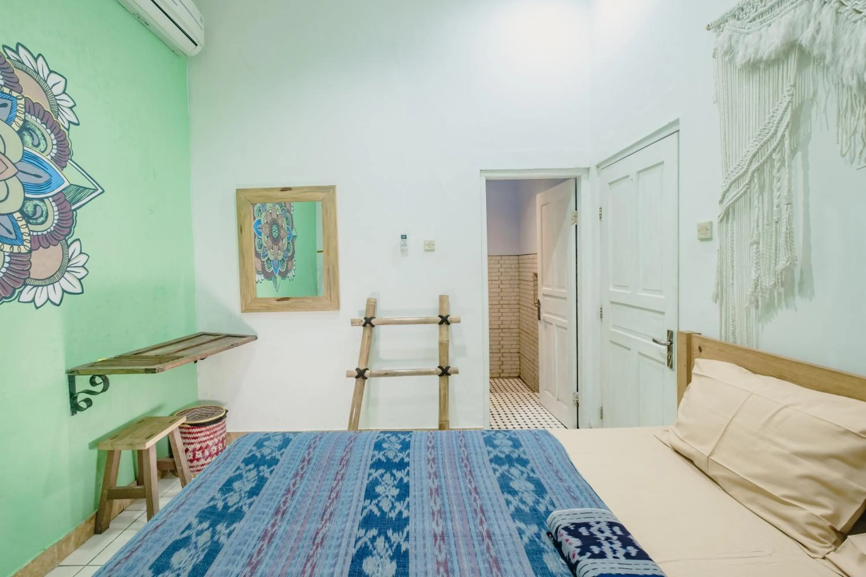 air conditioner, Bed in Happy Buddha Yogyakarta