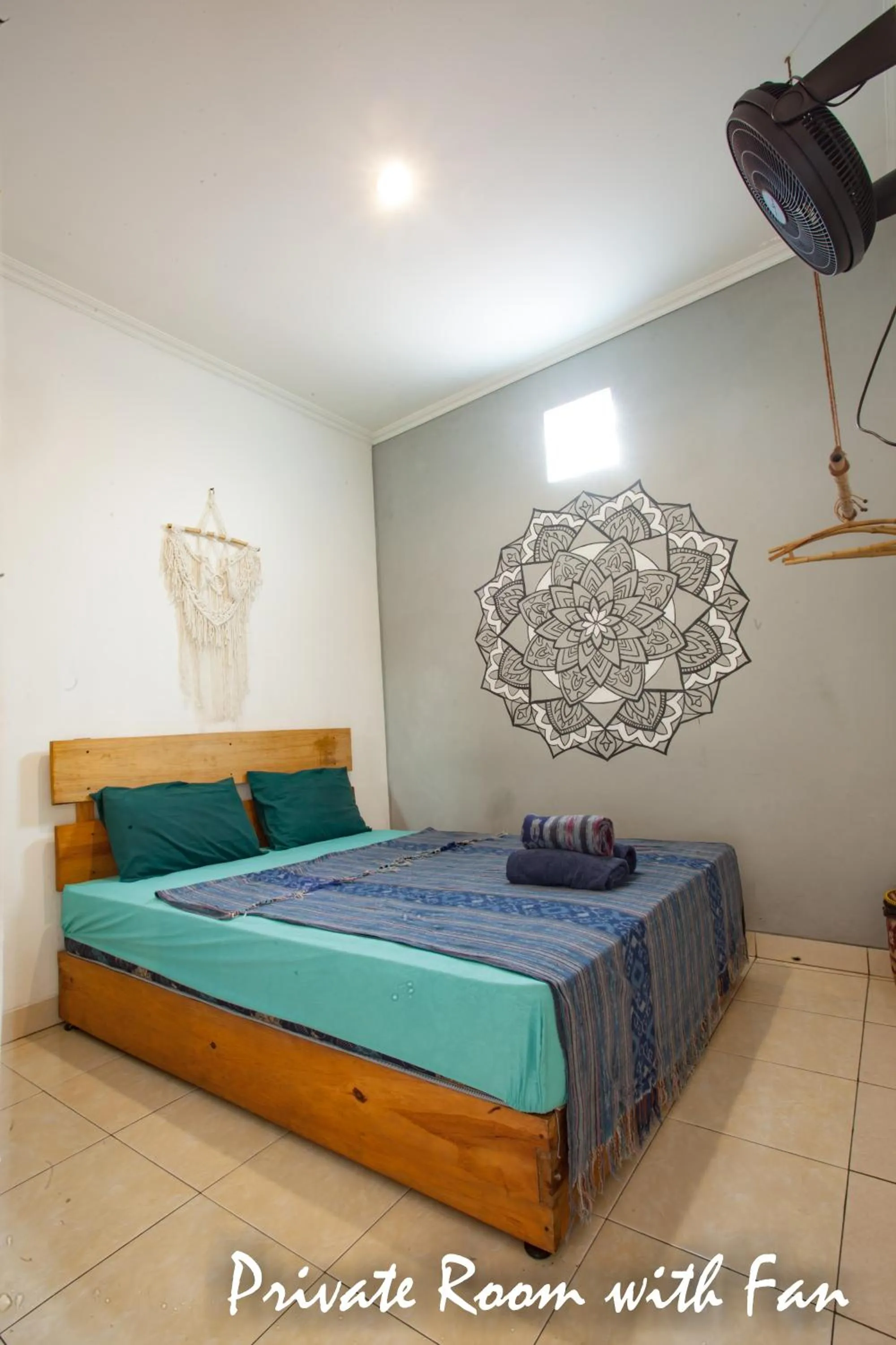 Bed in Happy Buddha Yogyakarta