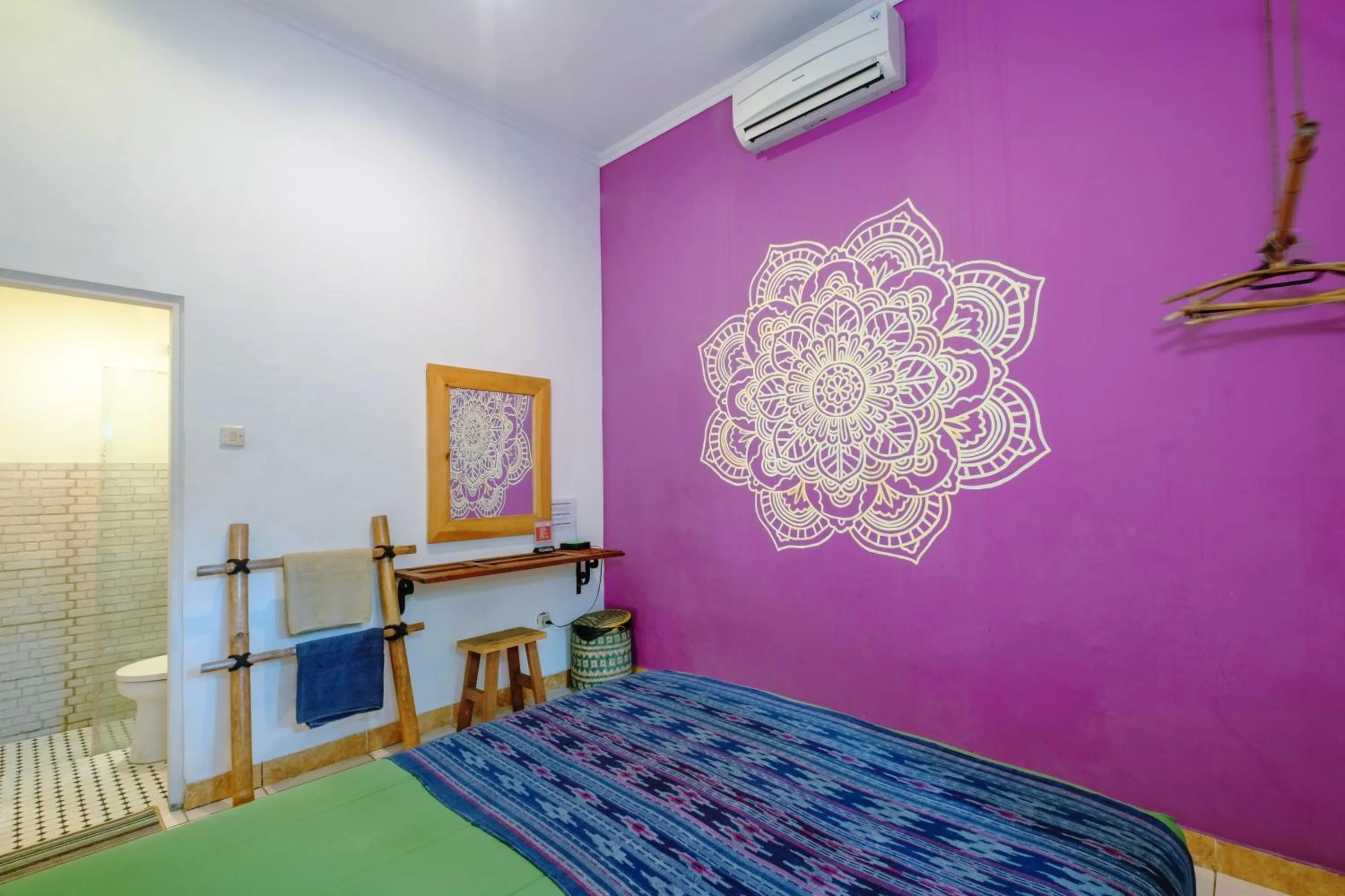 air conditioner, Bed in Happy Buddha Yogyakarta