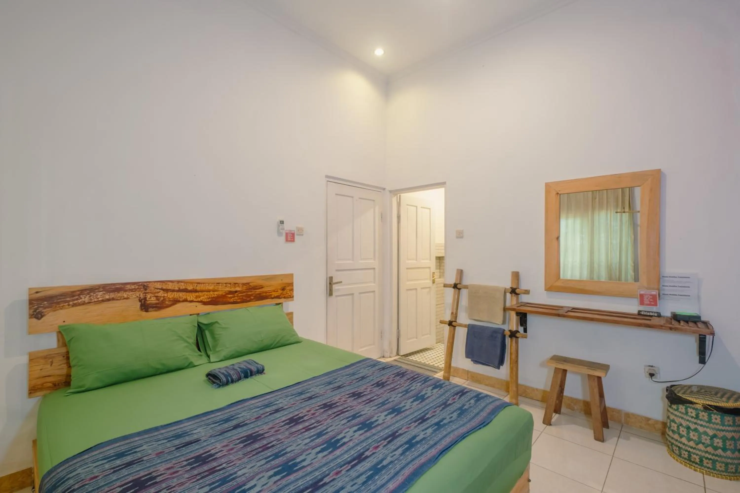 air conditioner, Bed in Happy Buddha Yogyakarta