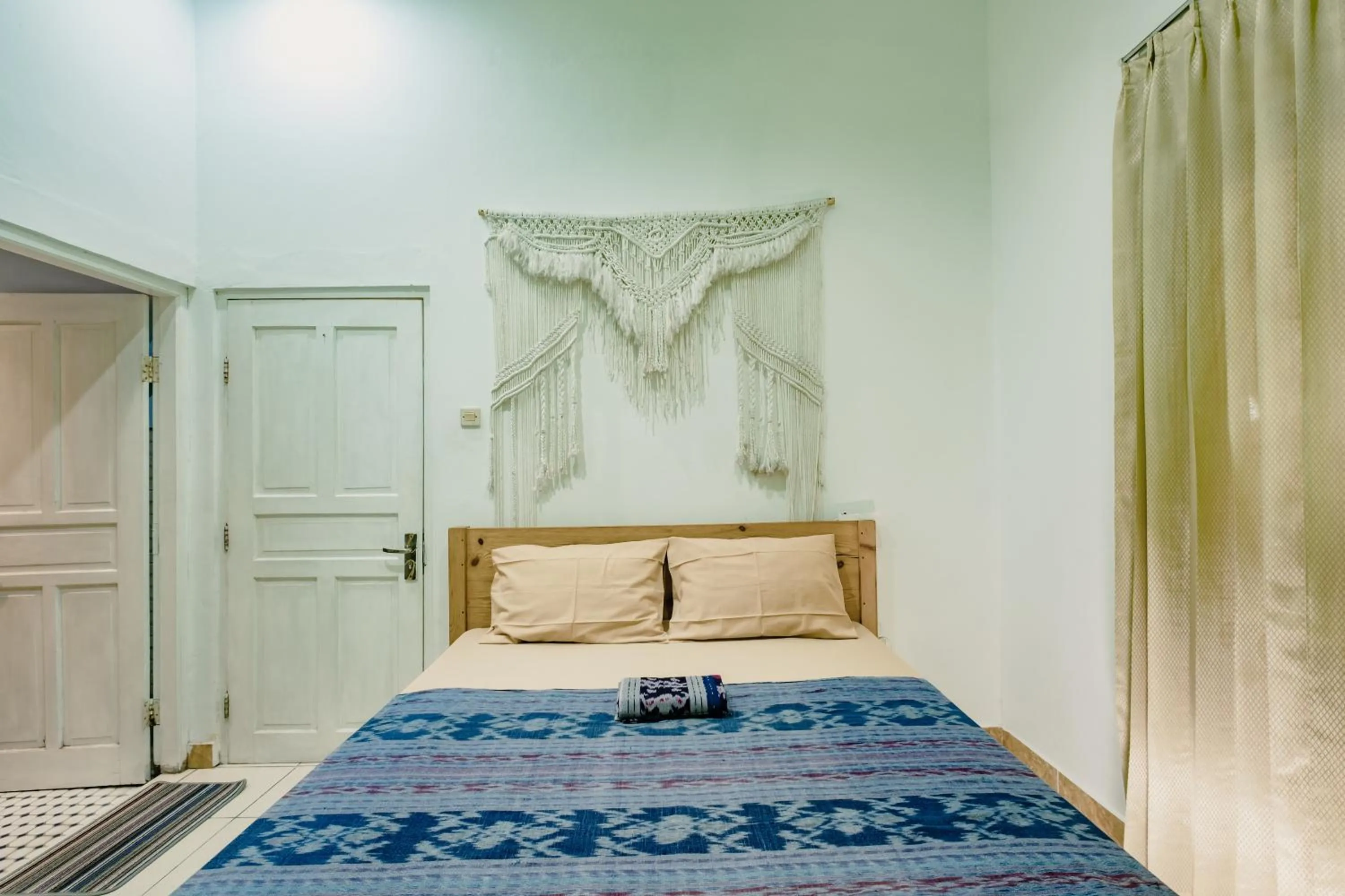 air conditioner, Bed in Happy Buddha Yogyakarta