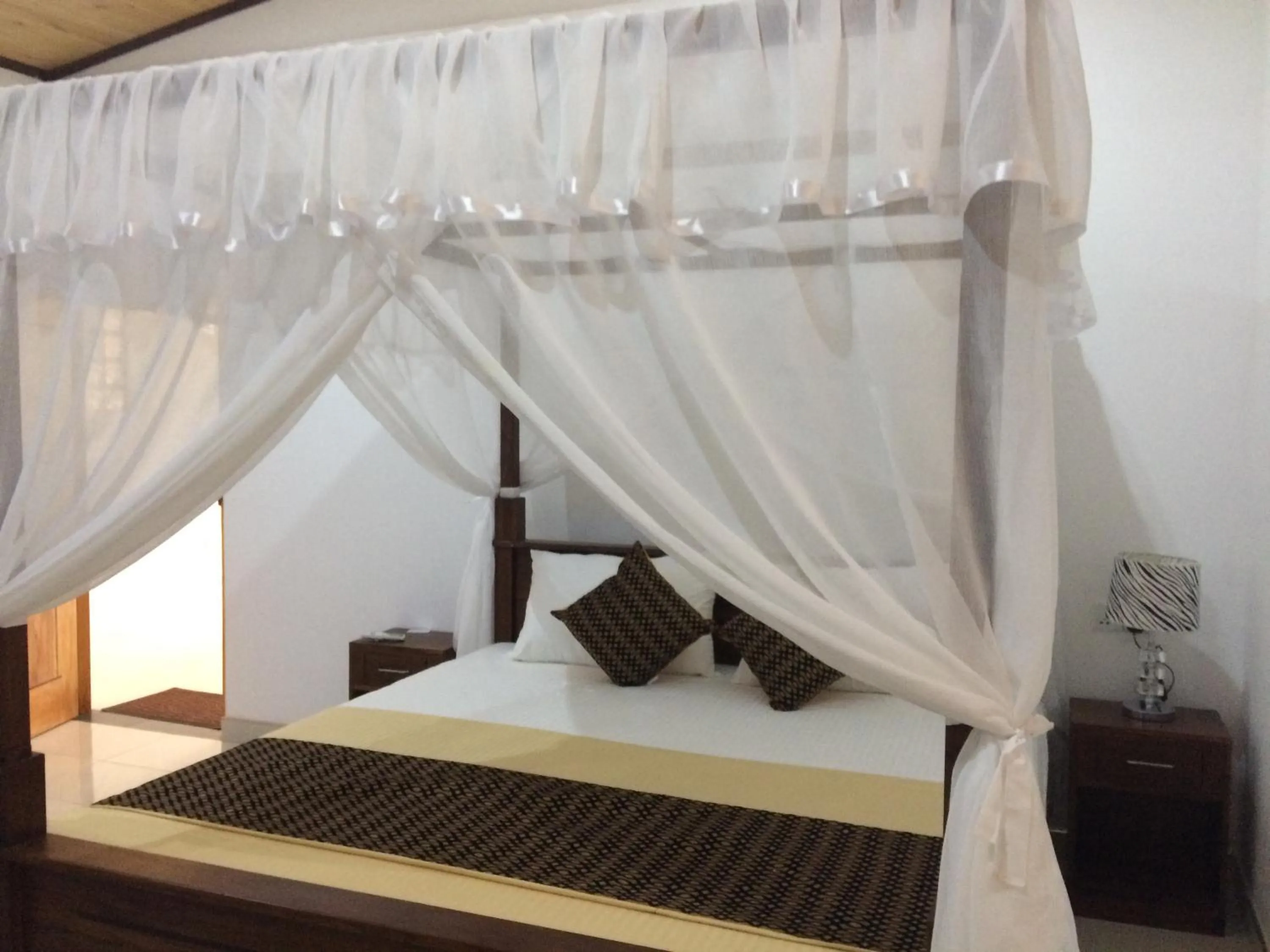 Bed in GG Lodge Mirissa