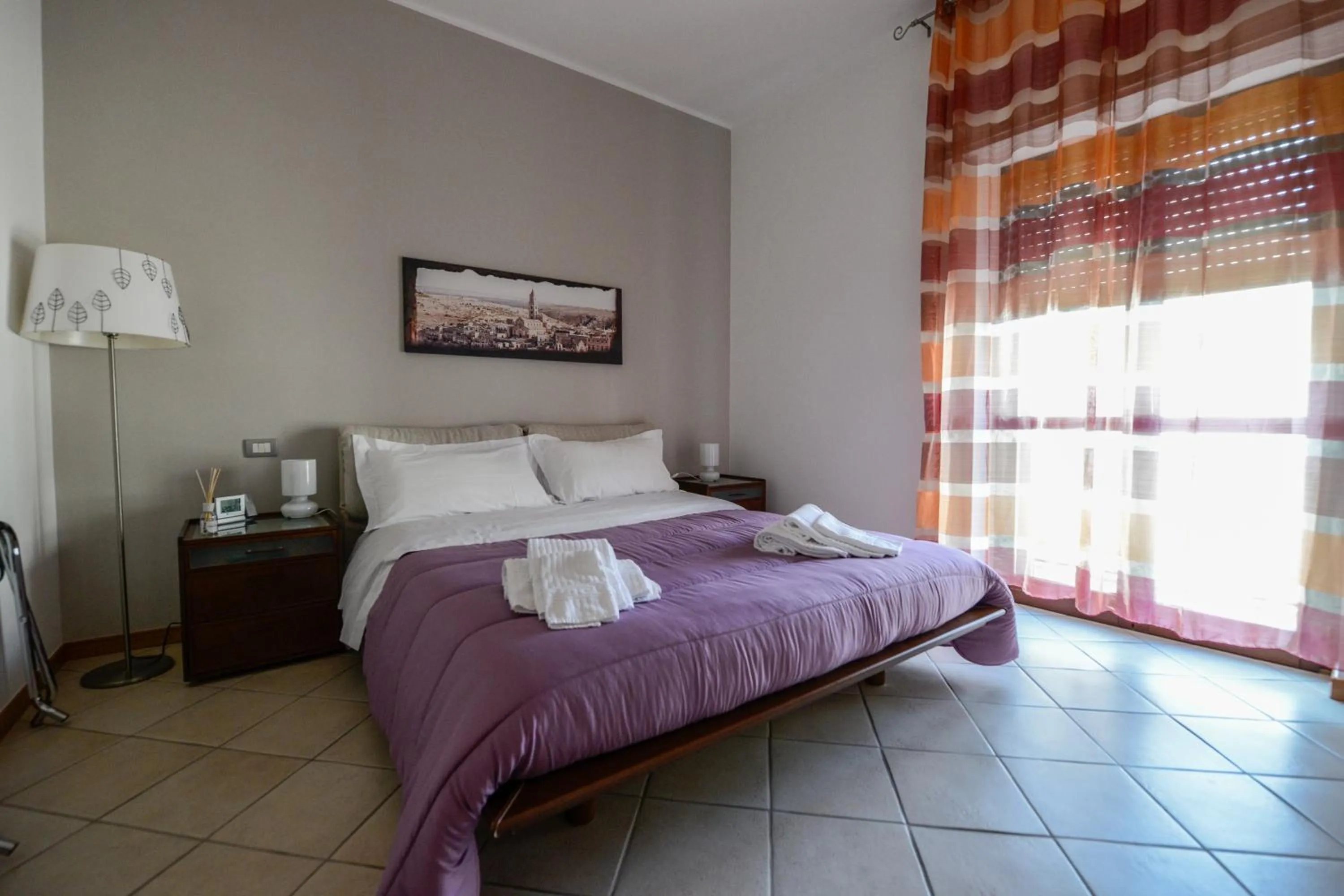 Photo of the whole room, Bed in Uno Sguardo Sui Sassi