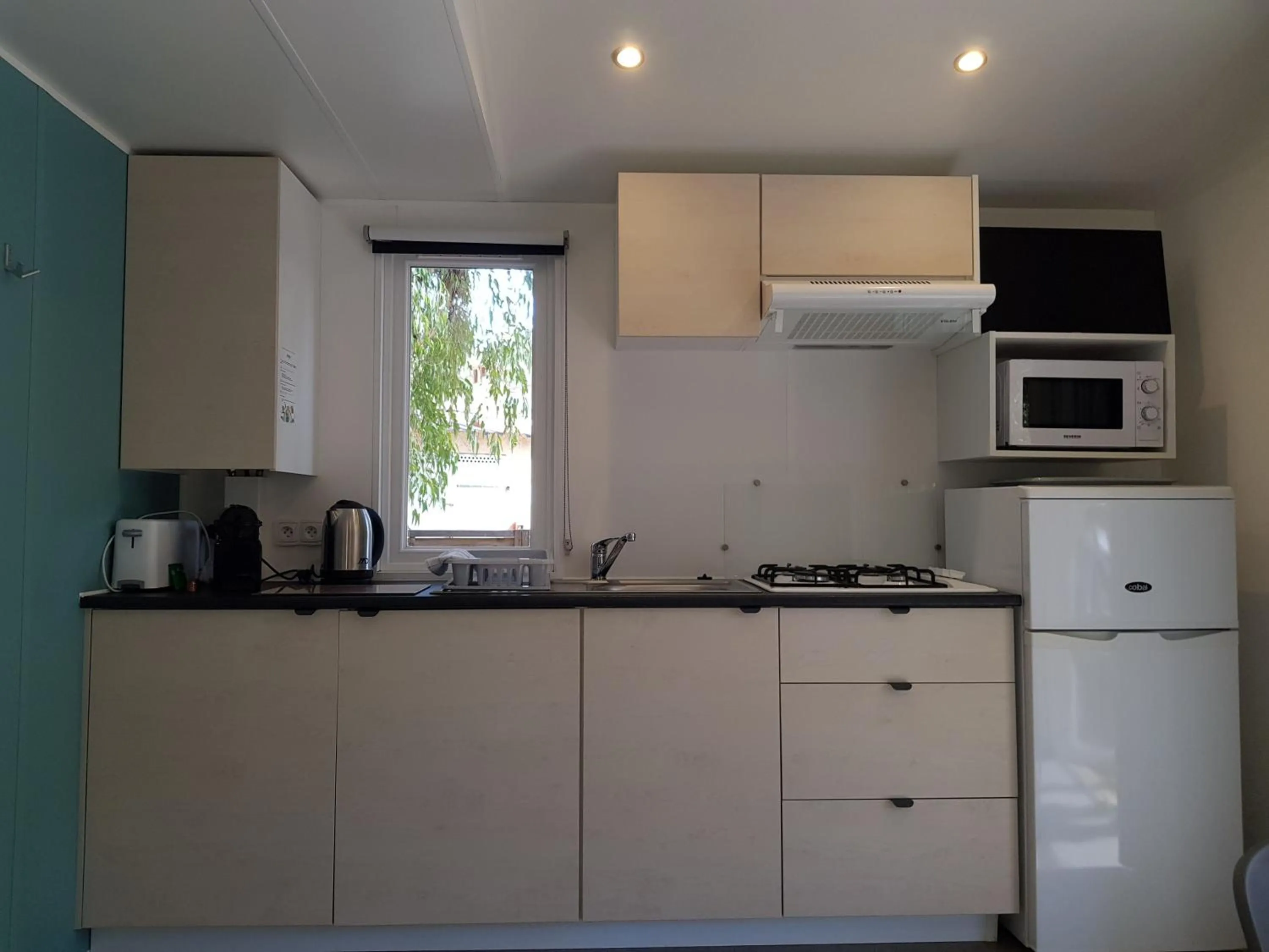 Kitchen or kitchenette in Camping Dolce Vita