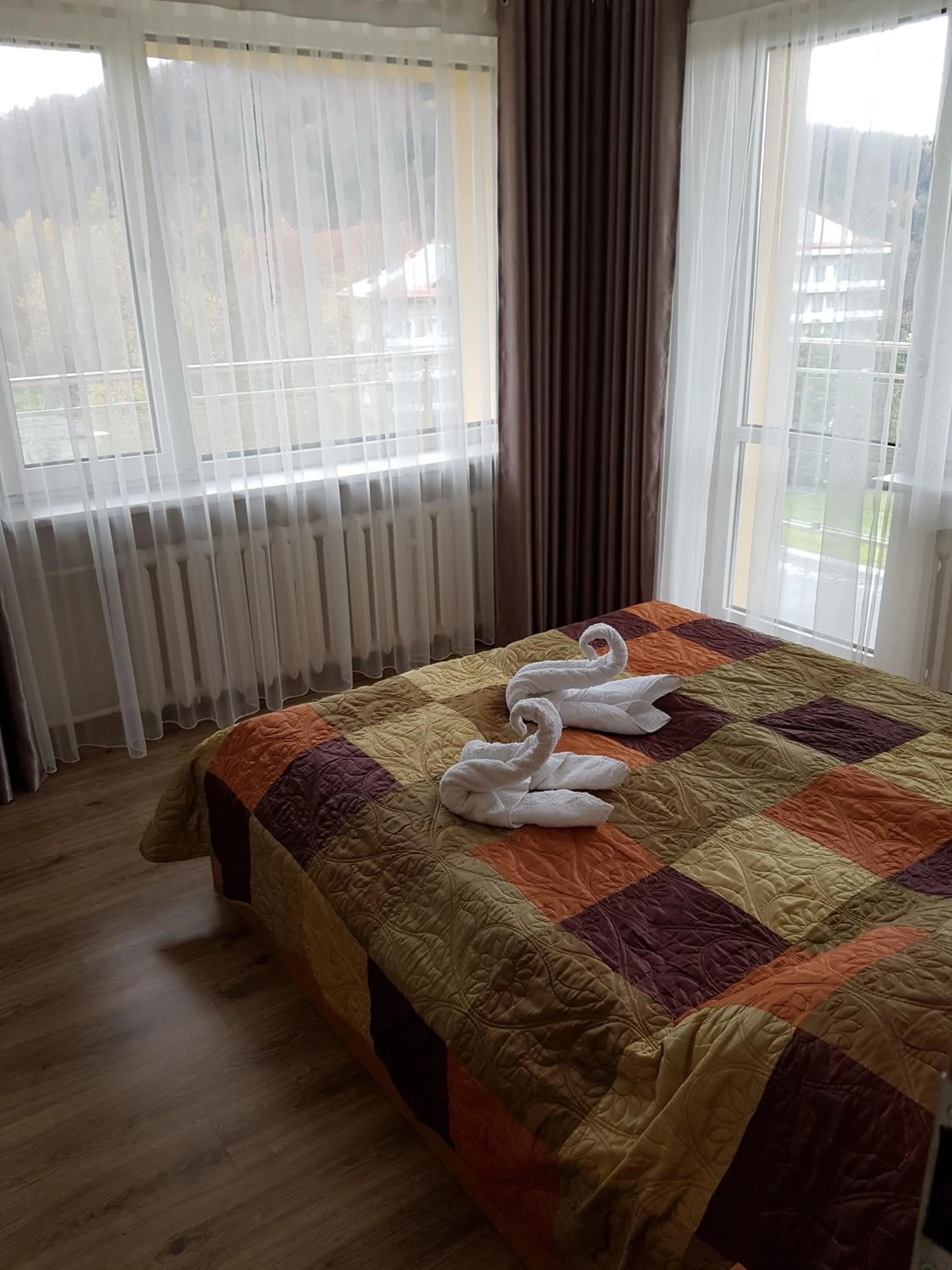 Bed in KORONA Sanatorium Uzdrowiskowe