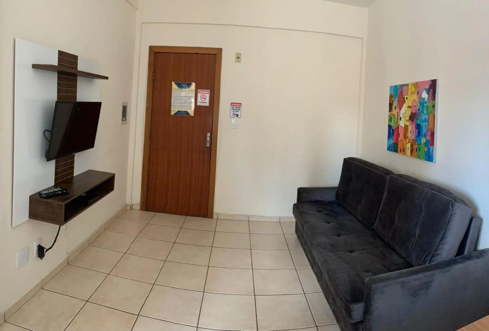 Communal lounge/ TV room in Apart Victoria