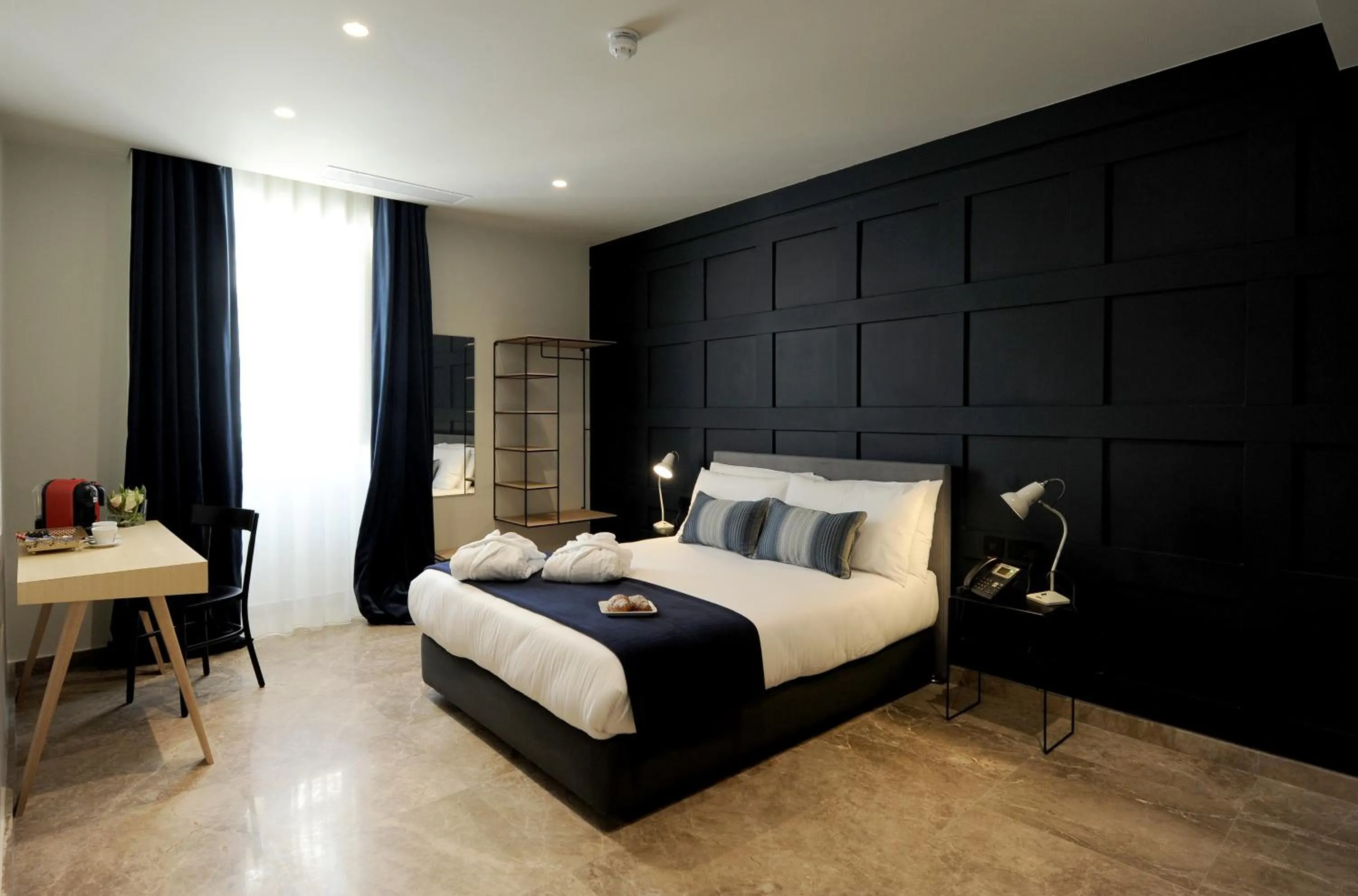 Bed in The Manoel Boutique Hotel
