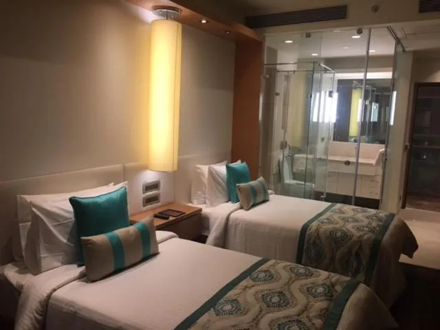 Bed in Deventure Sarovar Portico Kapashera, New Delhi